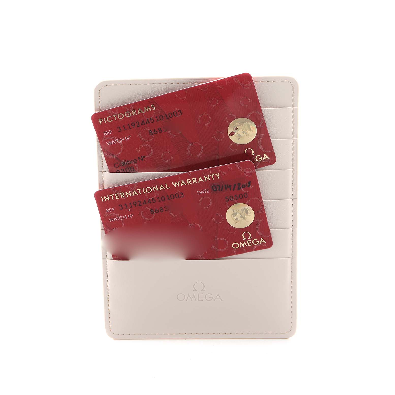 The image shows Omega Speedmaster 311.92.44.51.01.003 Men's Ceramic Black Dial cards in a cardholder, including pictograms and an international warranty.