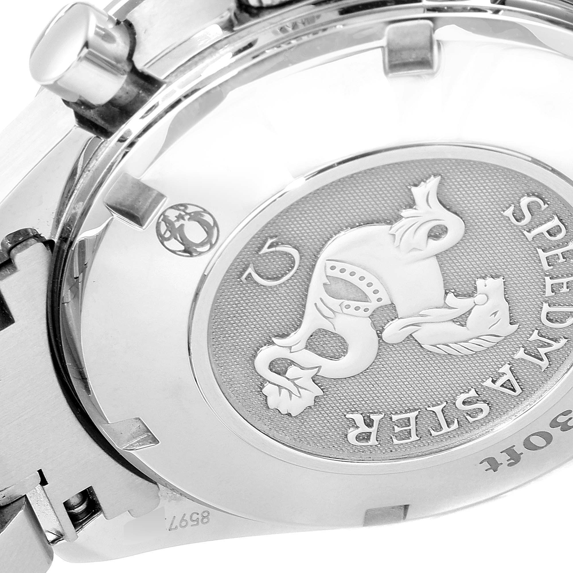 The image shows the case back of an Omega Speedmaster 323.30.40.40.06.001 Men's Stainless Steel Grey Dial 323.30.40.40.06.001 Men's Stainless Steel Grey Dial watch, displaying the logo and some engravings.