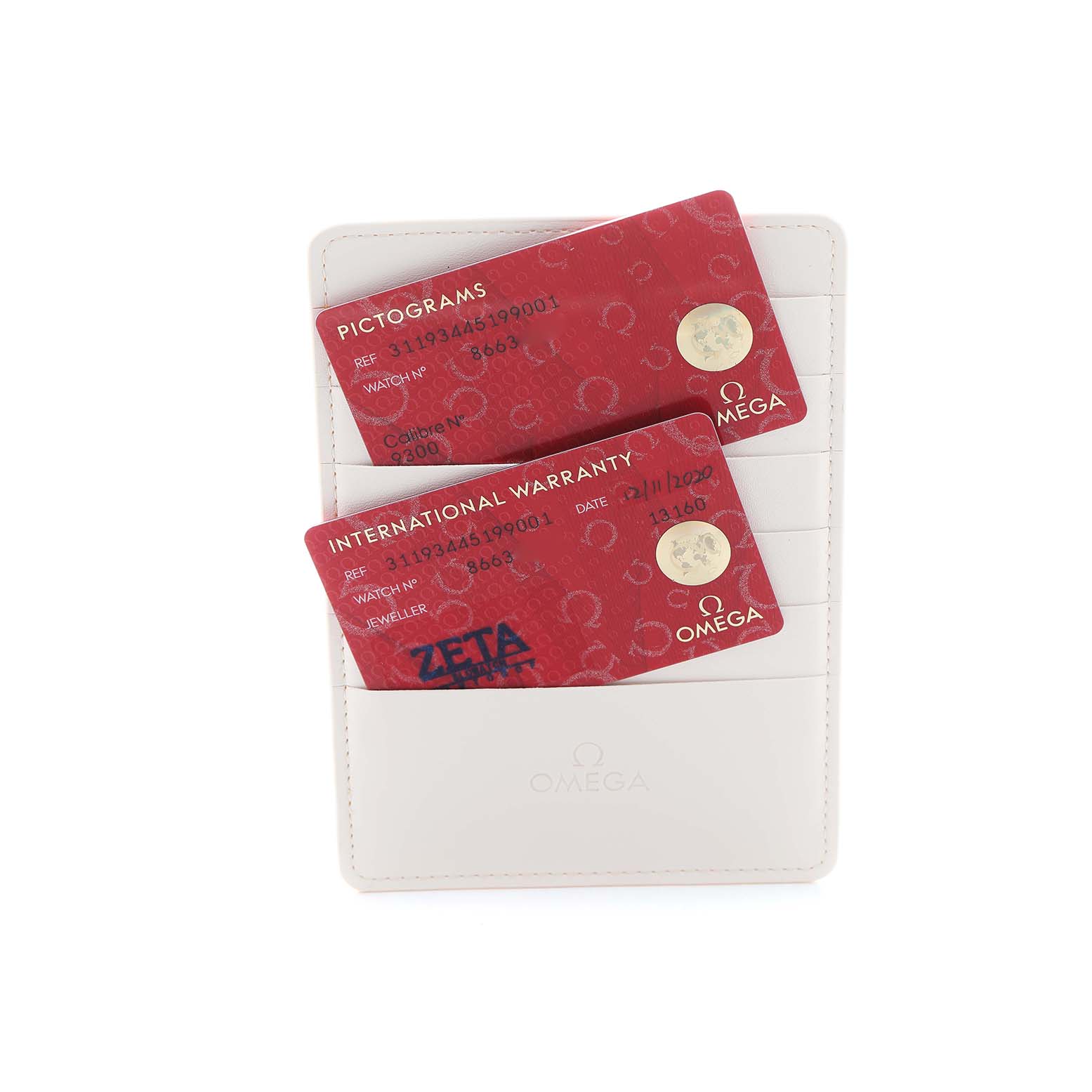 The image shows Omega Speedmaster 311.93.44.51.99.001 Men's Ceramic Grey Dial model warranty and pictogram cards inside a white cardholder.