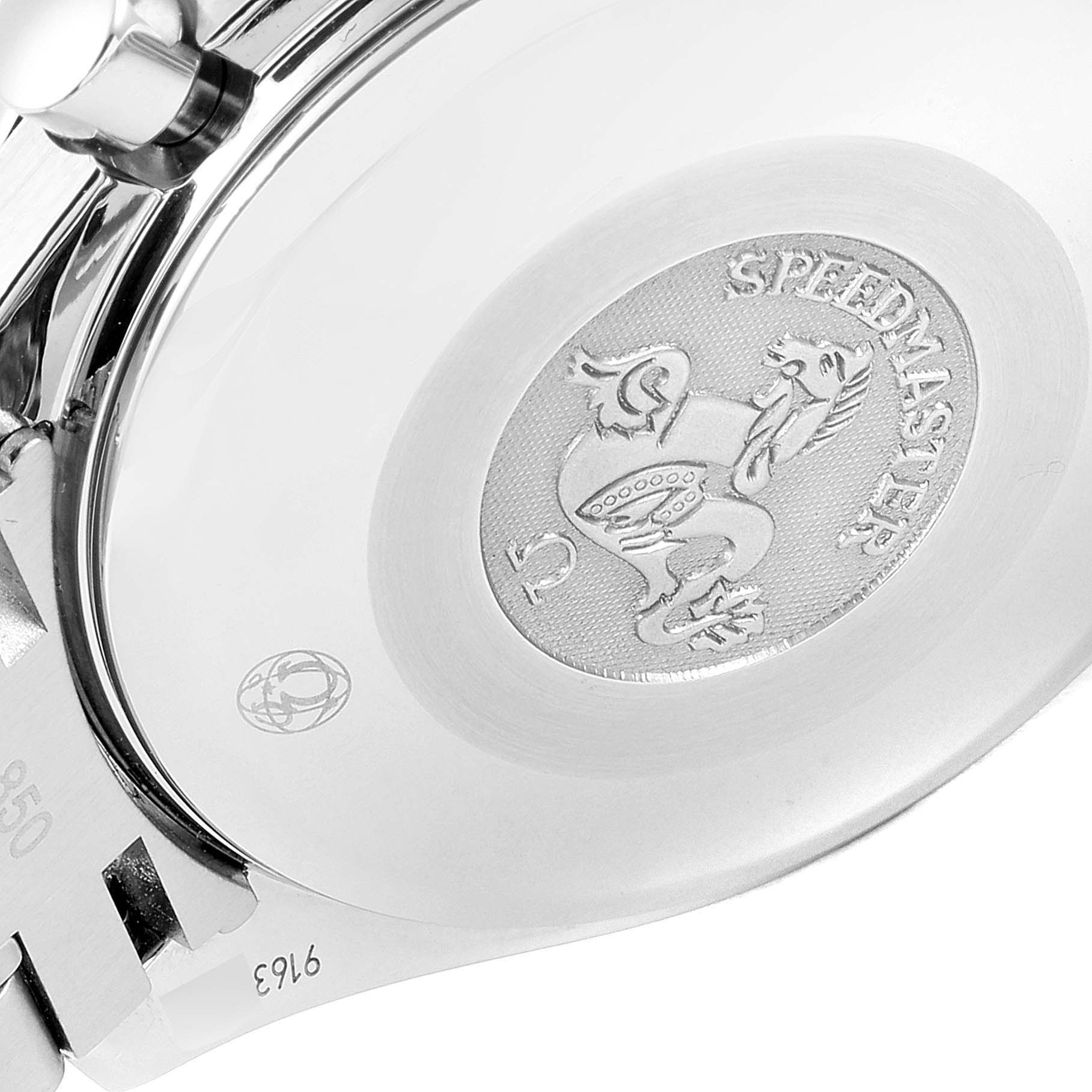 This image shows the engraved case back of an Omega Speedmaster 3515.20.00 Men
s Stainless Steel White Dial 3515.20.00 Men
s Stainless Steel White Dial watch at an angled close-up view.