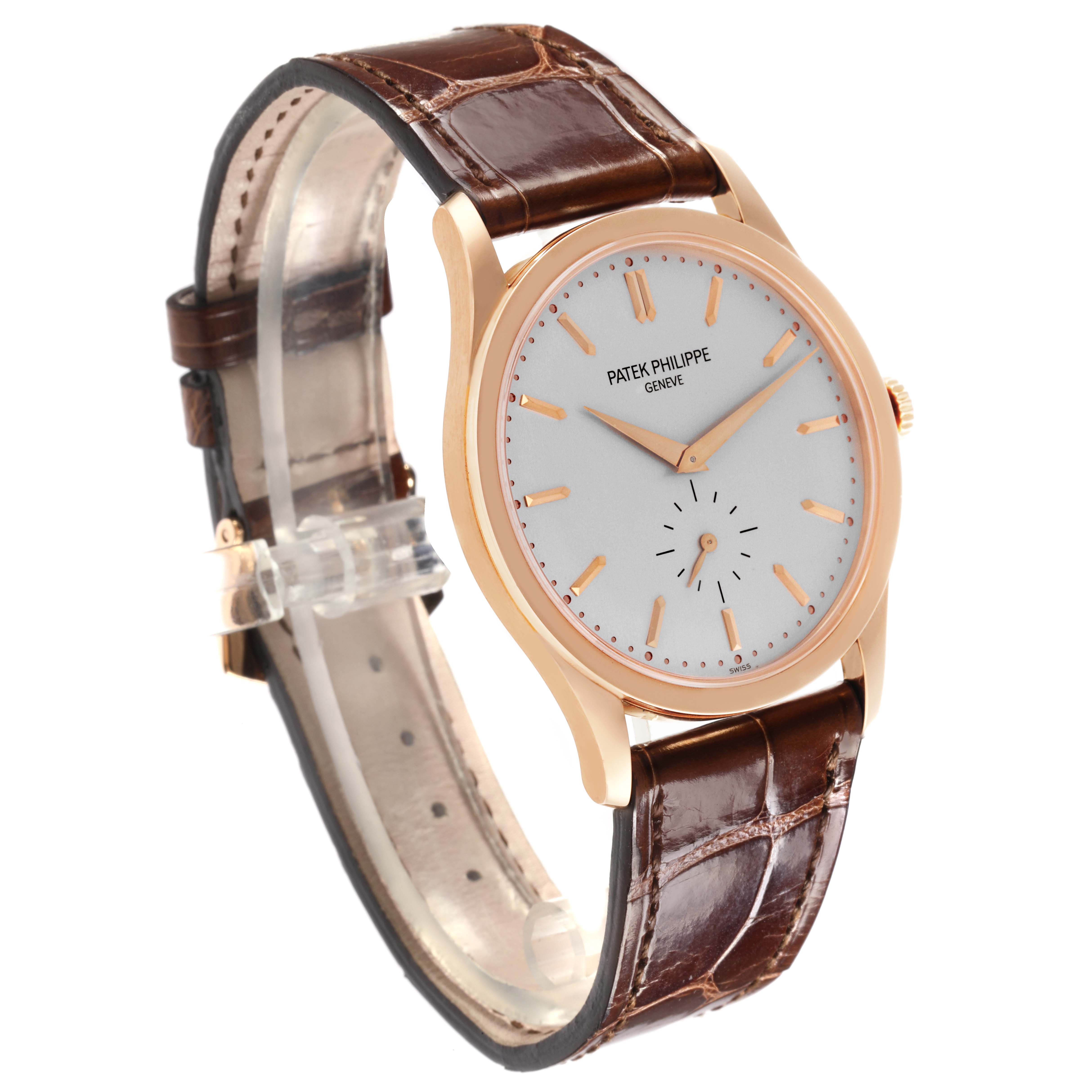 The Patek Philippe Calatrava 5196R-001 Men
s Rose Gold Silver Dial 5196R-001 Men
s Rose Gold Silver Dial watch is shown at a side angle, highlighting its face, bezel, and leather strap.