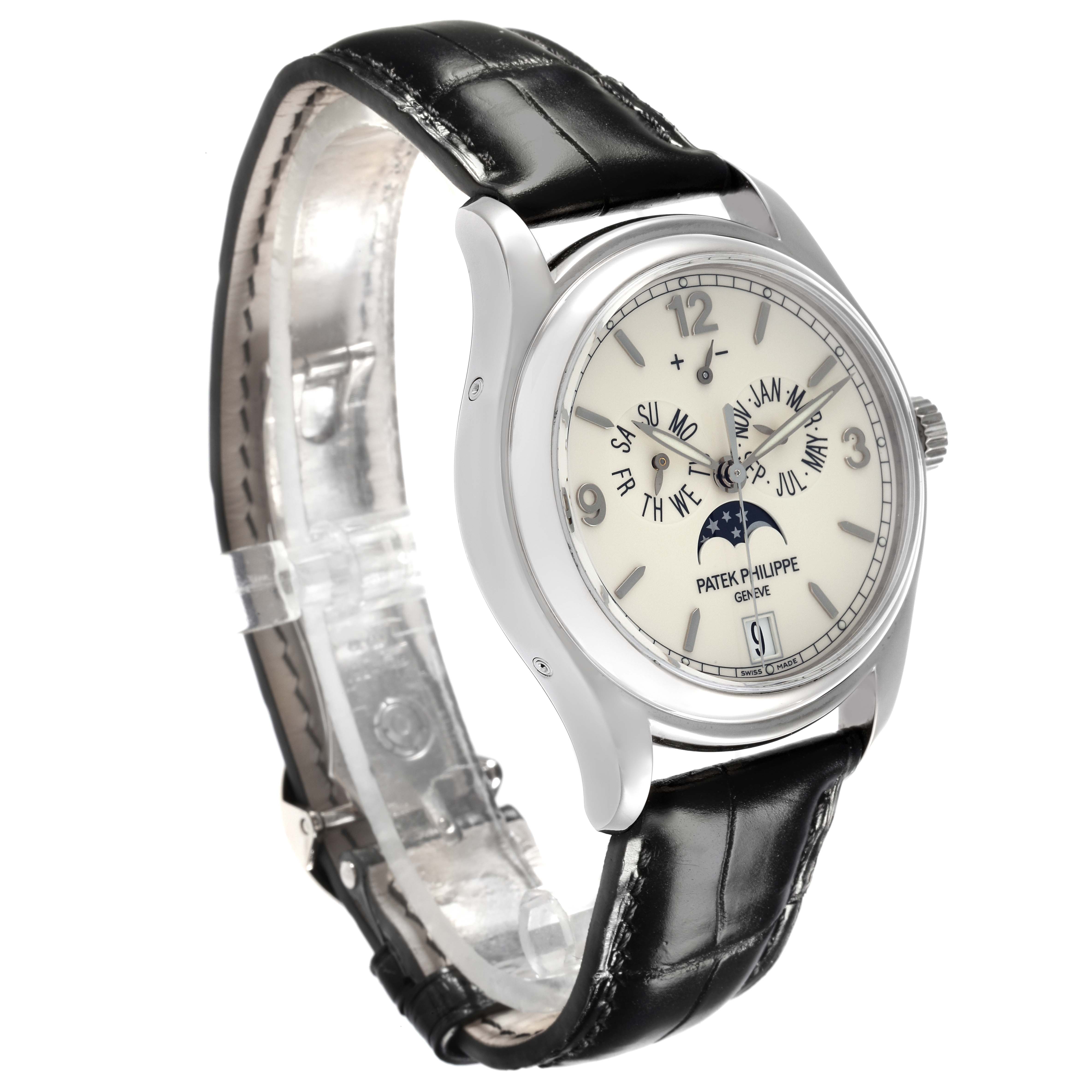 The image shows a Patek Philippe Complications 5146G Men
s White Gold White Dial 5146G Men
s White Gold White Dial watch at a front-left angle, displaying the face, strap, and side profile.