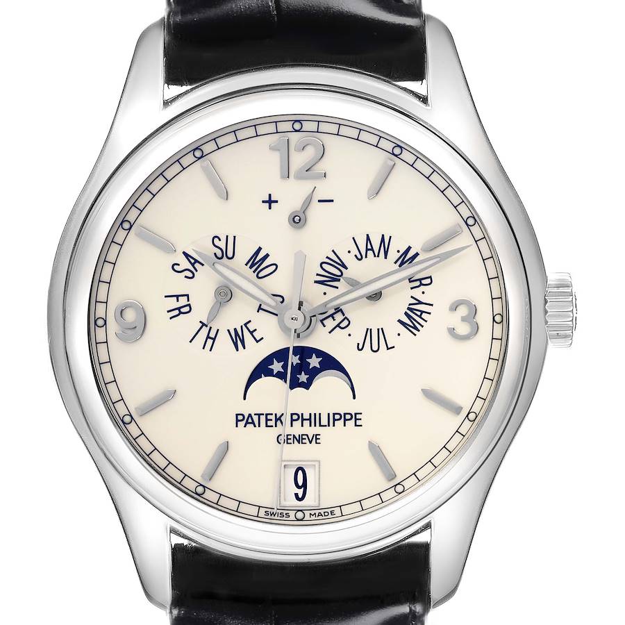 The Patek Philippe Complications watch is shown from the front, displaying the dial with calendar and moon phase features.