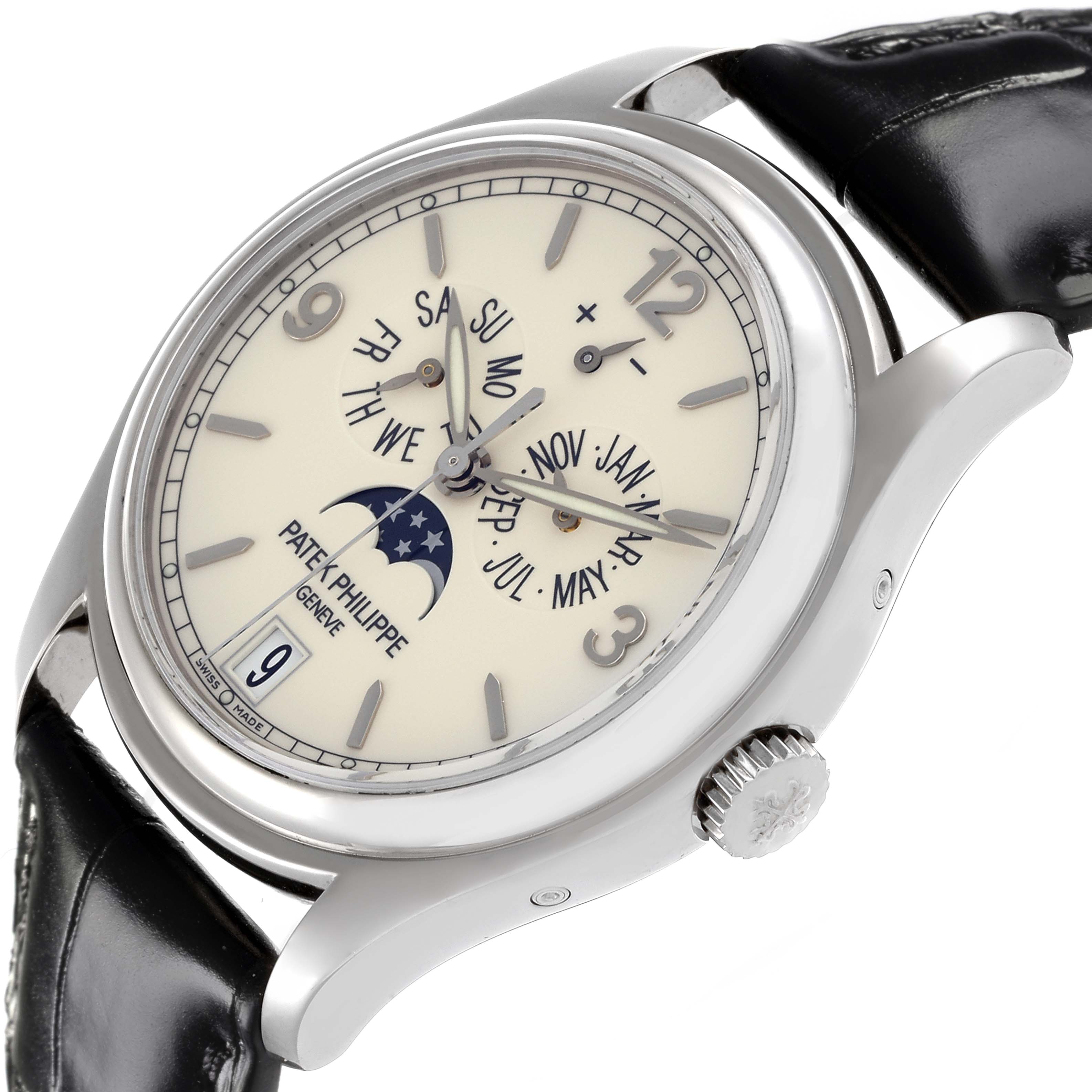 The Patek Philippe Complications 5146G Men
s White Gold White Dial 5146G Men
s White Gold White Dial watch is shown at an angled side view, displaying the dial, hands, crown, and part of the strap.