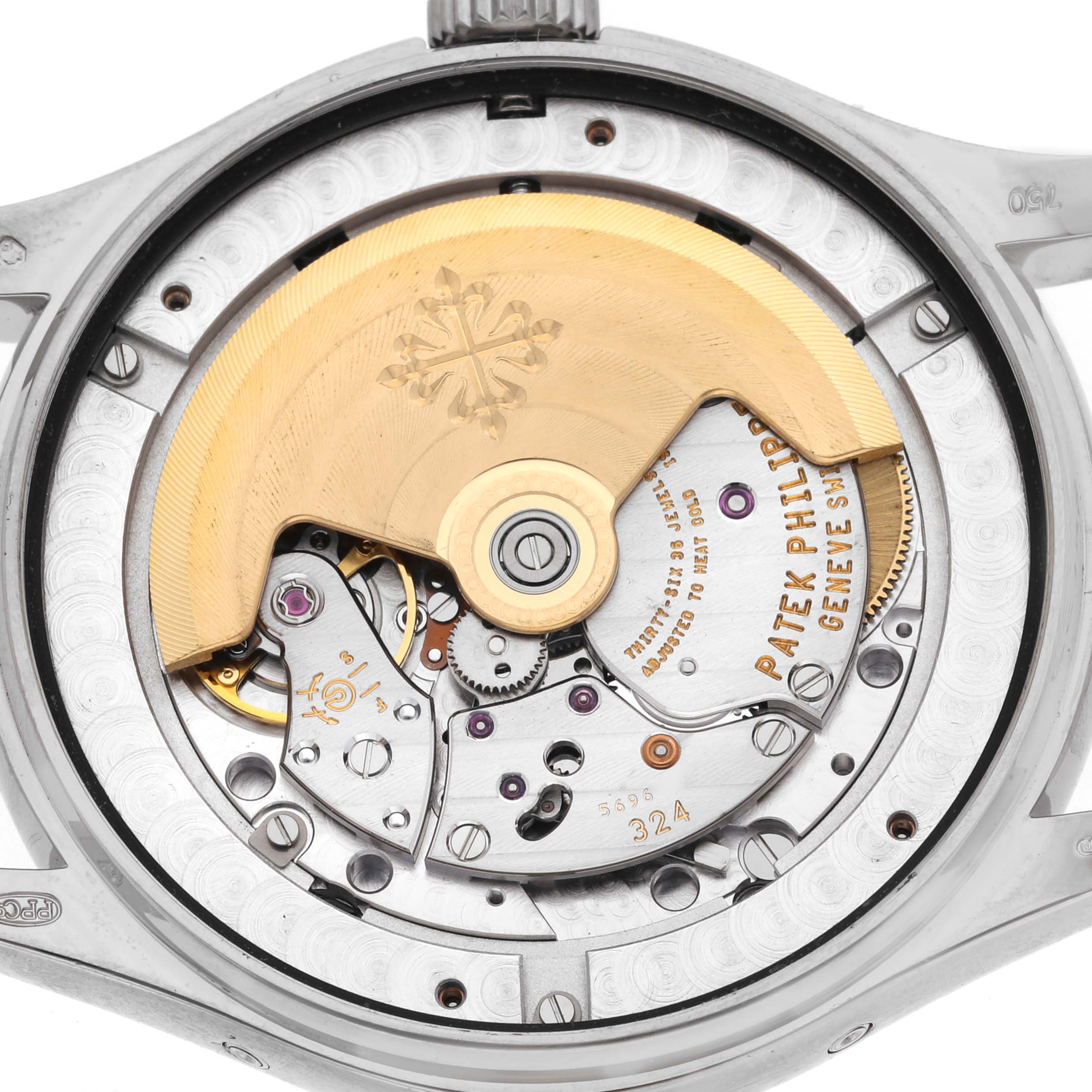 This image shows the movement and rotor from the back of a Patek Philippe Complications 5146G Men
s White Gold White Dial 5146G Men
s White Gold White Dial watch.