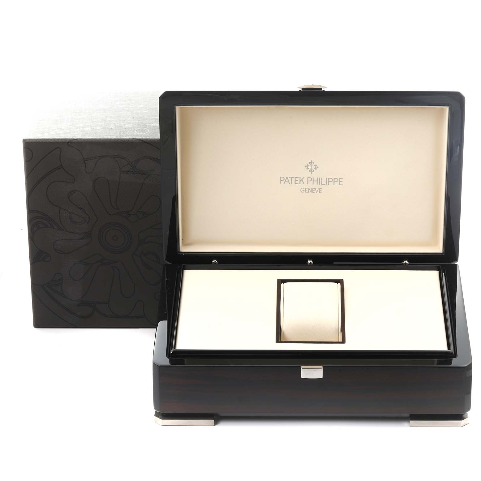 The image shows an open Patek Philippe Complications 5146G Men
s White Gold White Dial 5146G Men
s White Gold White Dial watch box, featuring the brand name inside.