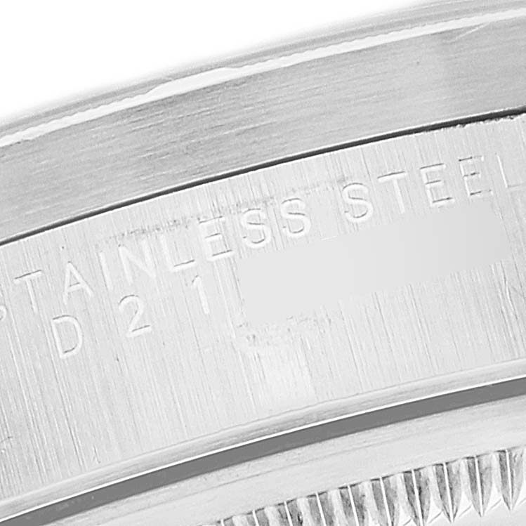 This image shows a close-up of the stainless steel caseback edge of the Rolex Air-King 14010 Men's Stainless Steel Black Dial 14010 Men's Stainless Steel Black Dial watch.