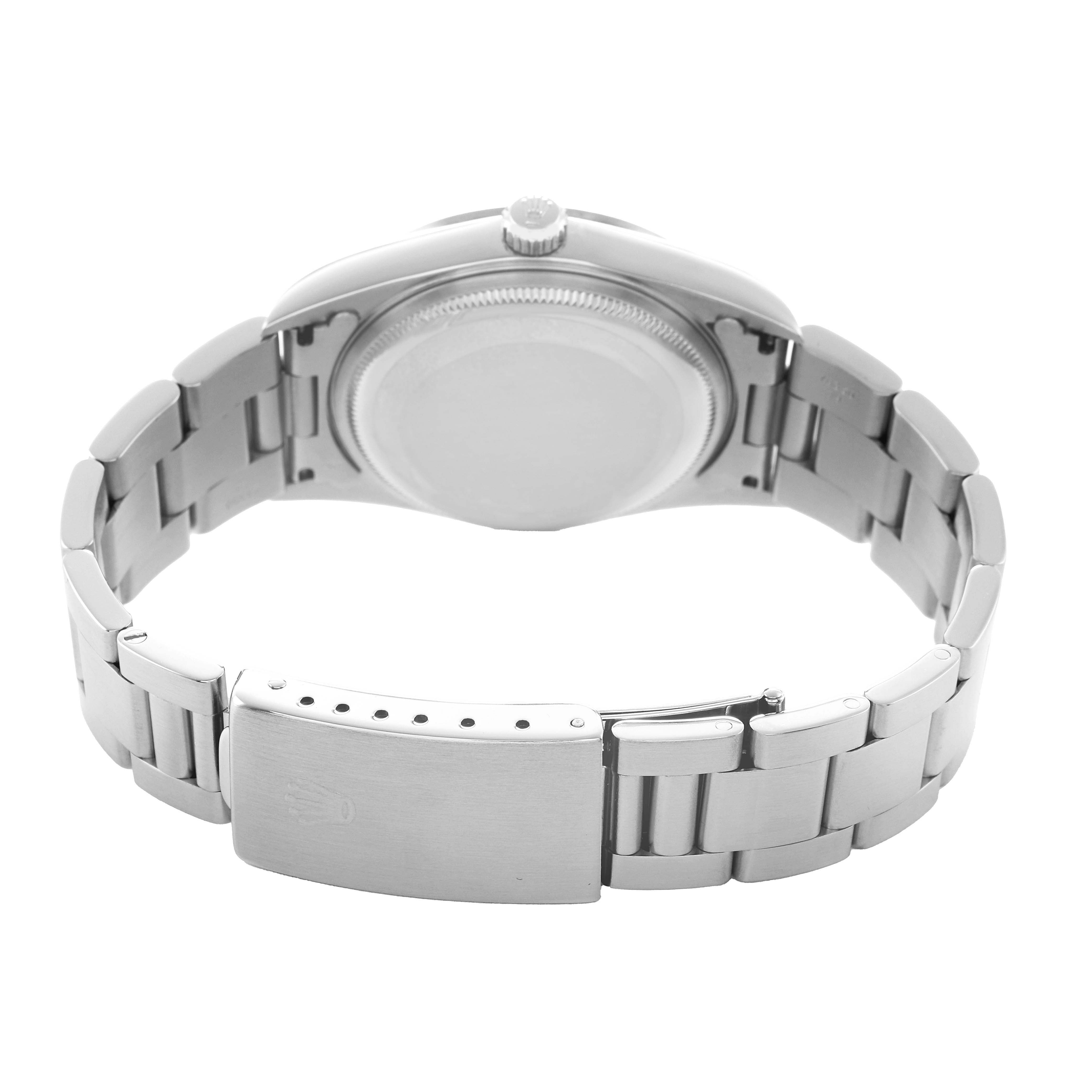 The Rolex Air-King 14000 Men's Stainless Steel Black Dial watch is shown from the back, highlighting the case back, bracelet, and clasp.