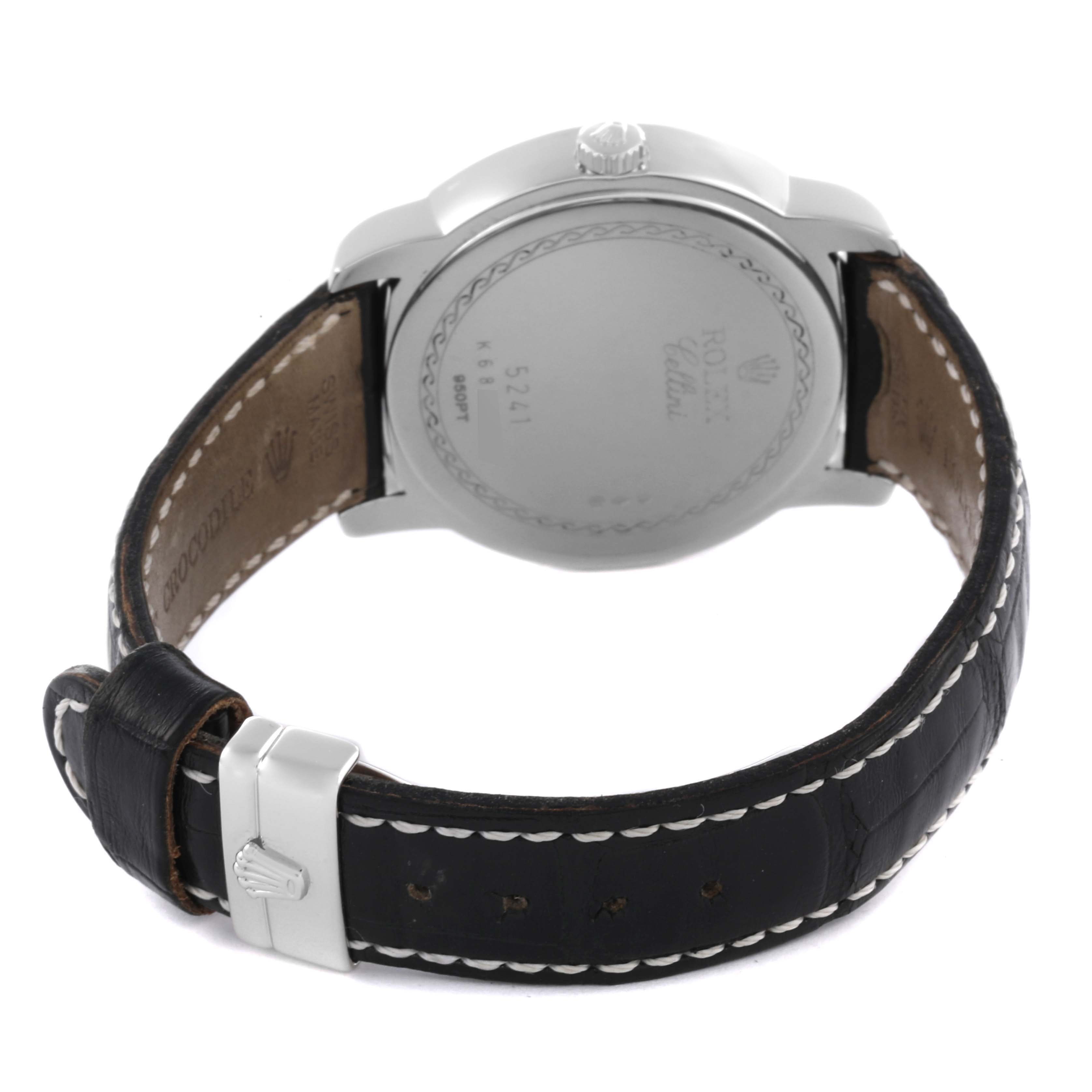 The image shows the back of a Rolex Cellini 5241/6 Men's Platinum Black Dial 5241/6 Men's Platinum Black Dial watch, focusing on the caseback, crown, and buckle on the leather strap.