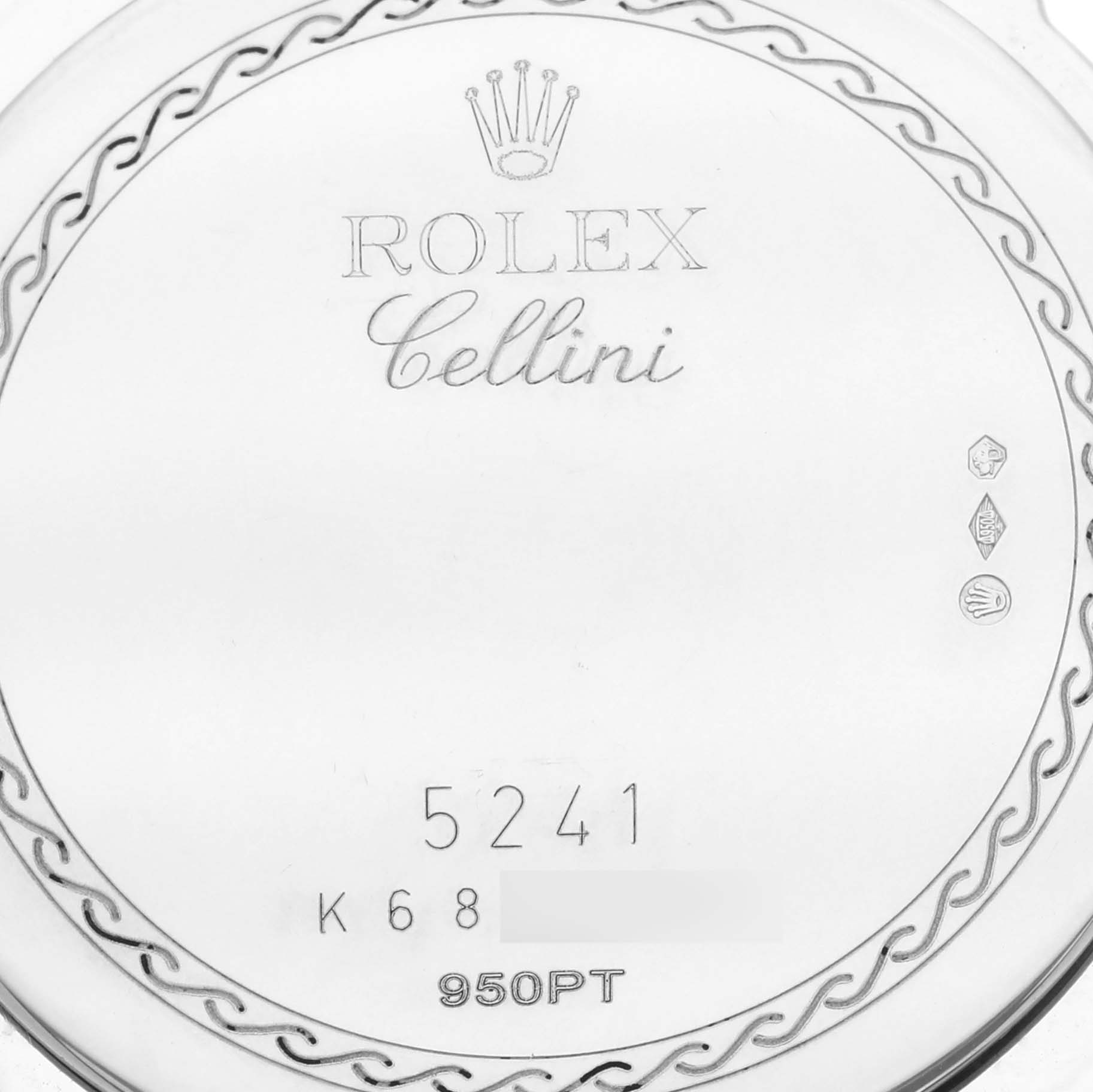The image shows the back of a Rolex Cellini 5241/6 Men's Platinum Black Dial 5241/6 Men's Platinum Black Dial watch, featuring engravings and hallmarks.