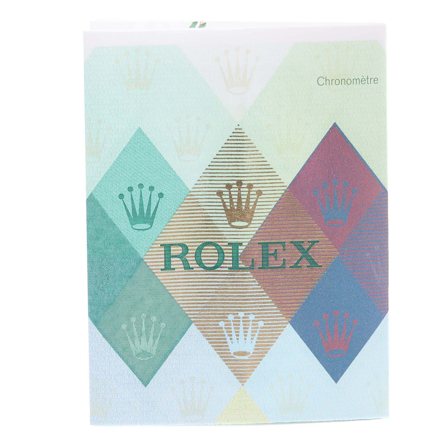 The image shows a decorative card or booklet featuring the Rolex logo, not the Cellini watch itself.