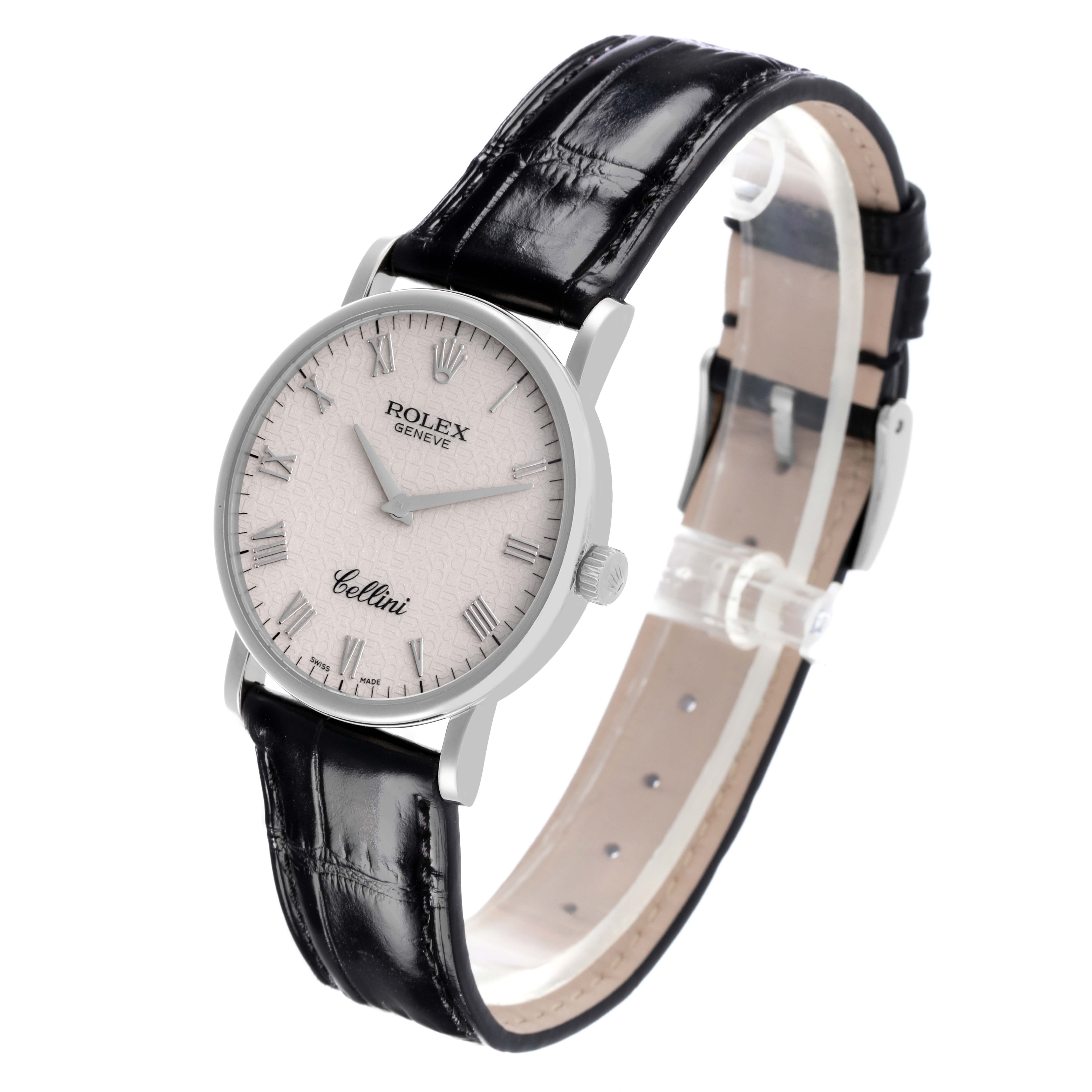 The Rolex Cellini 5115/9 Men's White Gold White Dial 5115/9 Men's White Gold White Dial watch is shown at a three-quarter angle, highlighting the dial, case, and leather strap.