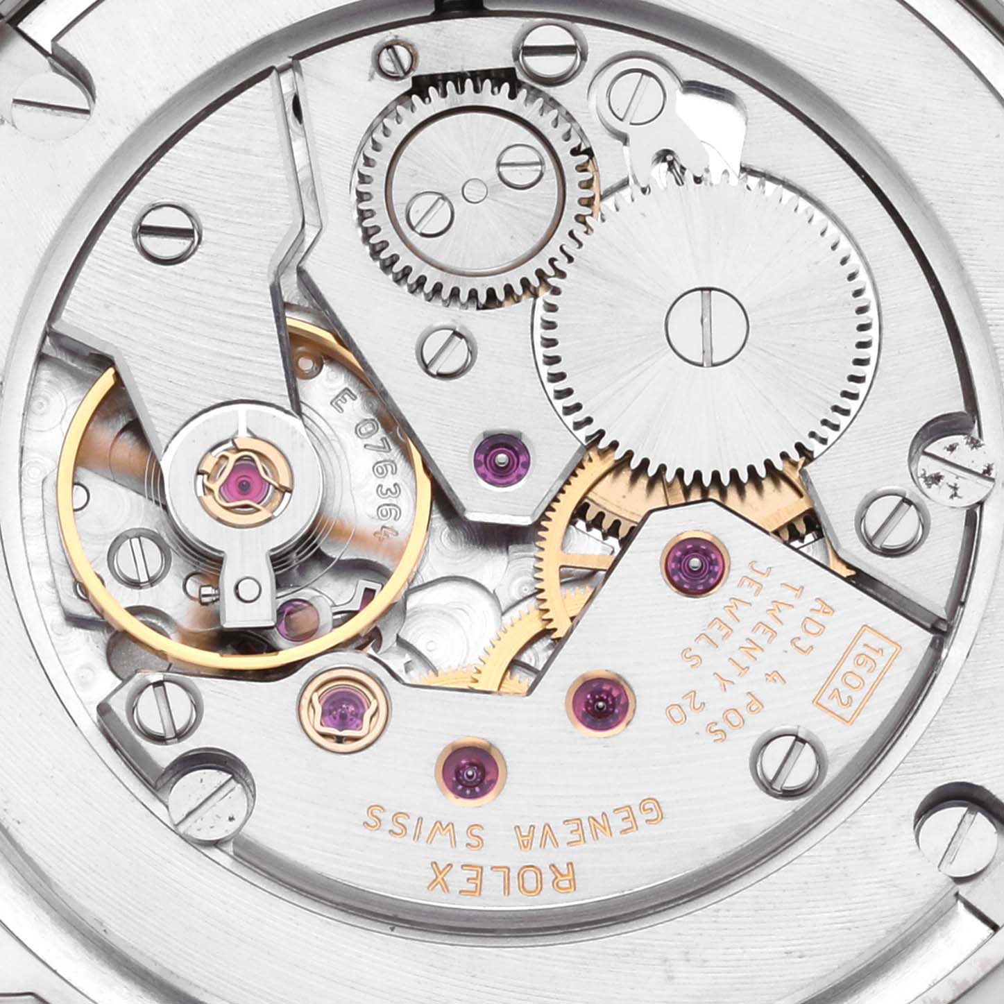 The image shows the internal mechanism of a Rolex Cellini 5115/9 Men's White Gold White Dial 5115/9 Men's White Gold White Dial watch, highlighting gears and jewels from a top-down angle.