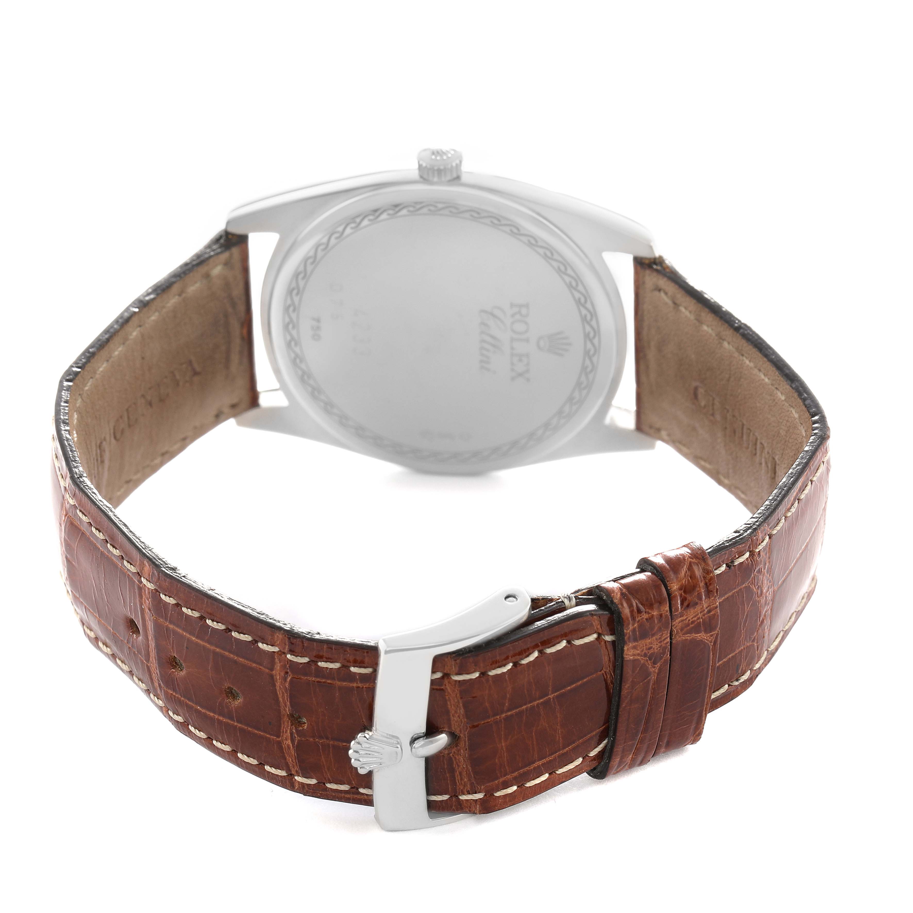 The image shows the back of the Rolex Cellini 4233 Men's White Gold Black Dial watch, highlighting its leather strap and buckle.