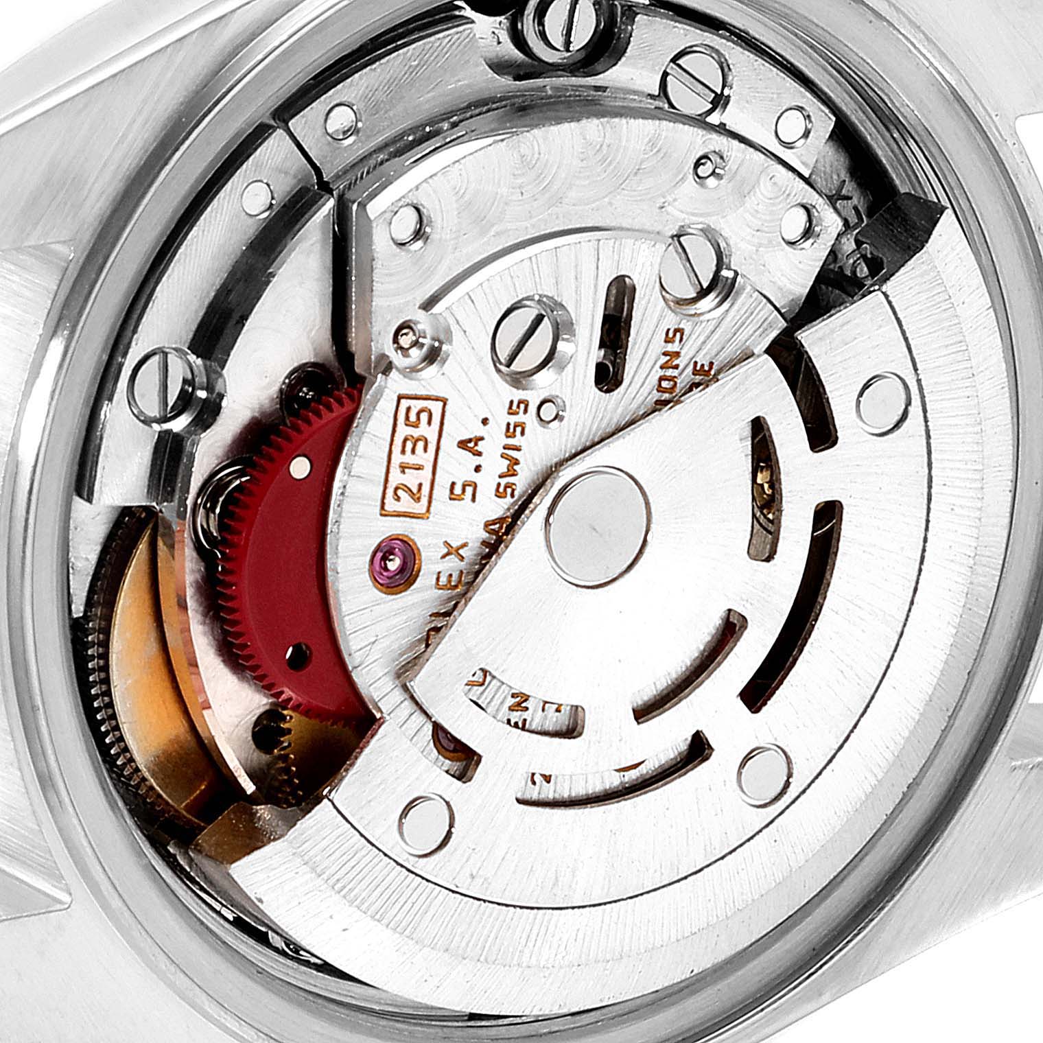 The image shows a detailed view of the movement mechanism inside the Rolex Datejust 69173 Women
s Steel and Gold (two tone) Champagne Dial 69173 Women
s Steel and Gold (two tone) Champagne Dial watch.
