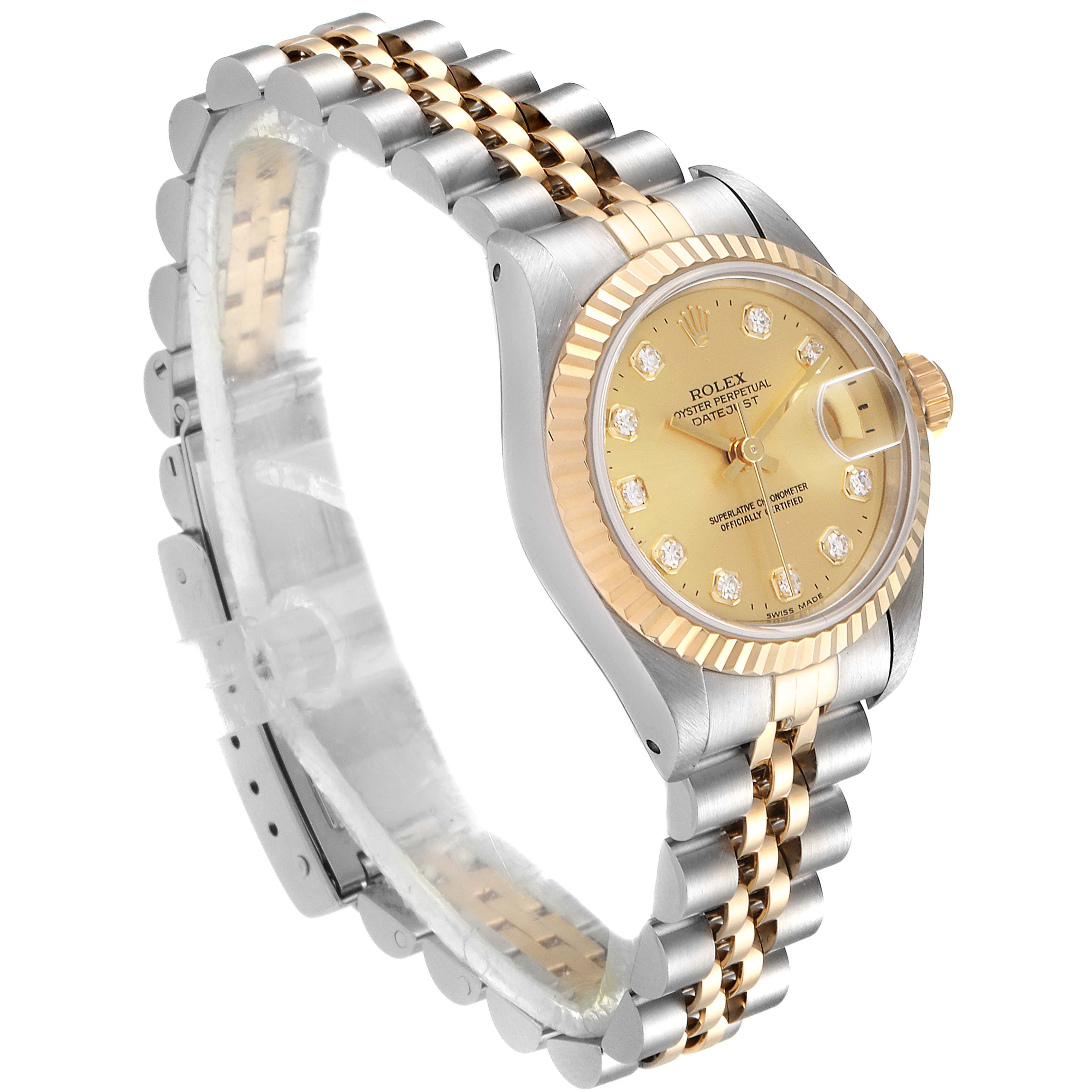 This Rolex Datejust 69173 Women
s Steel and Gold (two tone) Champagne Dial 69173 Women
s Steel and Gold (two tone) Champagne Dial watch is shown from a slightly elevated side angle, highlighting its face, bezel, and Jubilee bracelet.