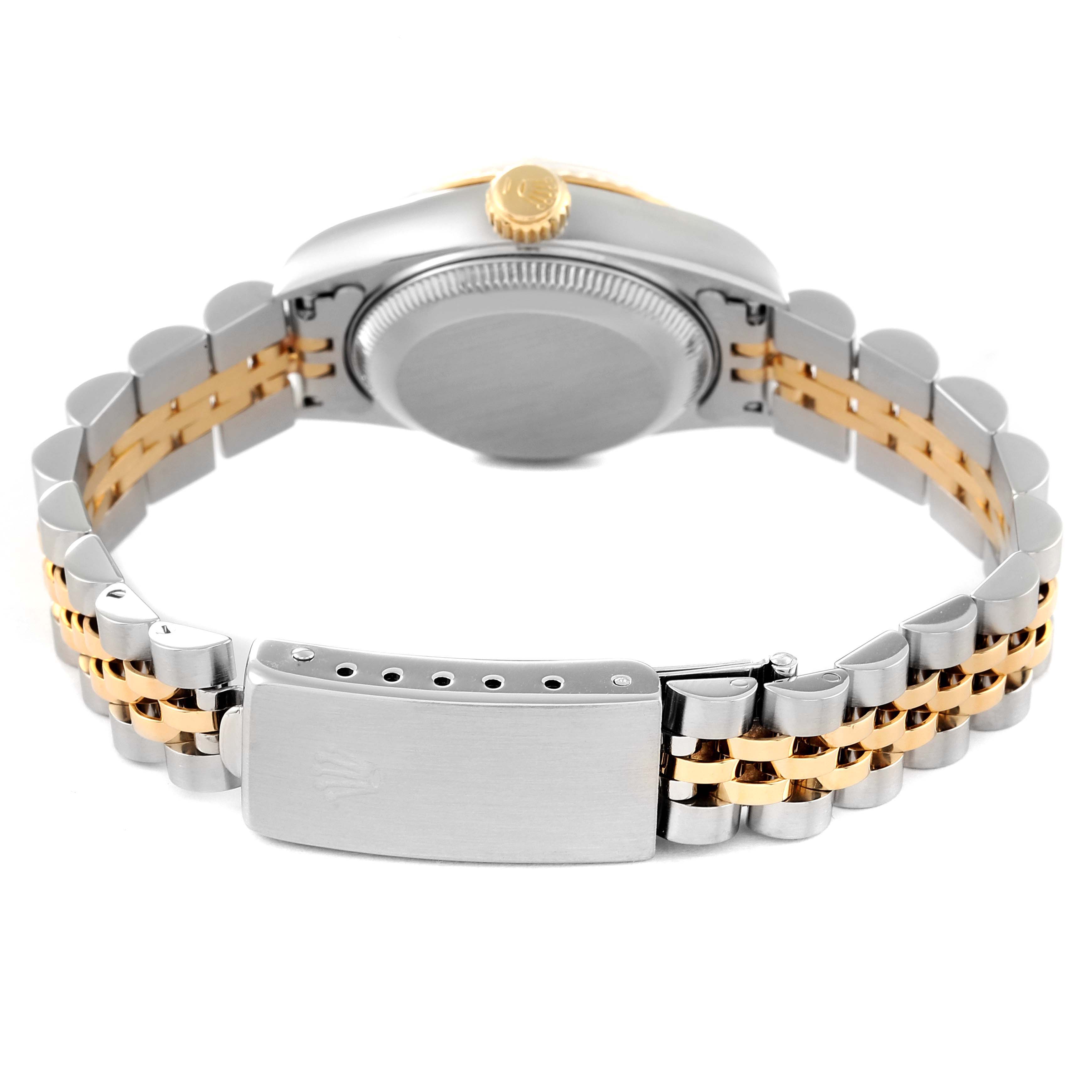 This Rolex Datejust 69173 Women's Steel and Gold (two tone) Silver Dial 69173 Women's Steel and Gold (two tone) Silver Dial watch is shown from the back, highlighting the two-tone bracelet and clasp, along with part of the case back and crown.