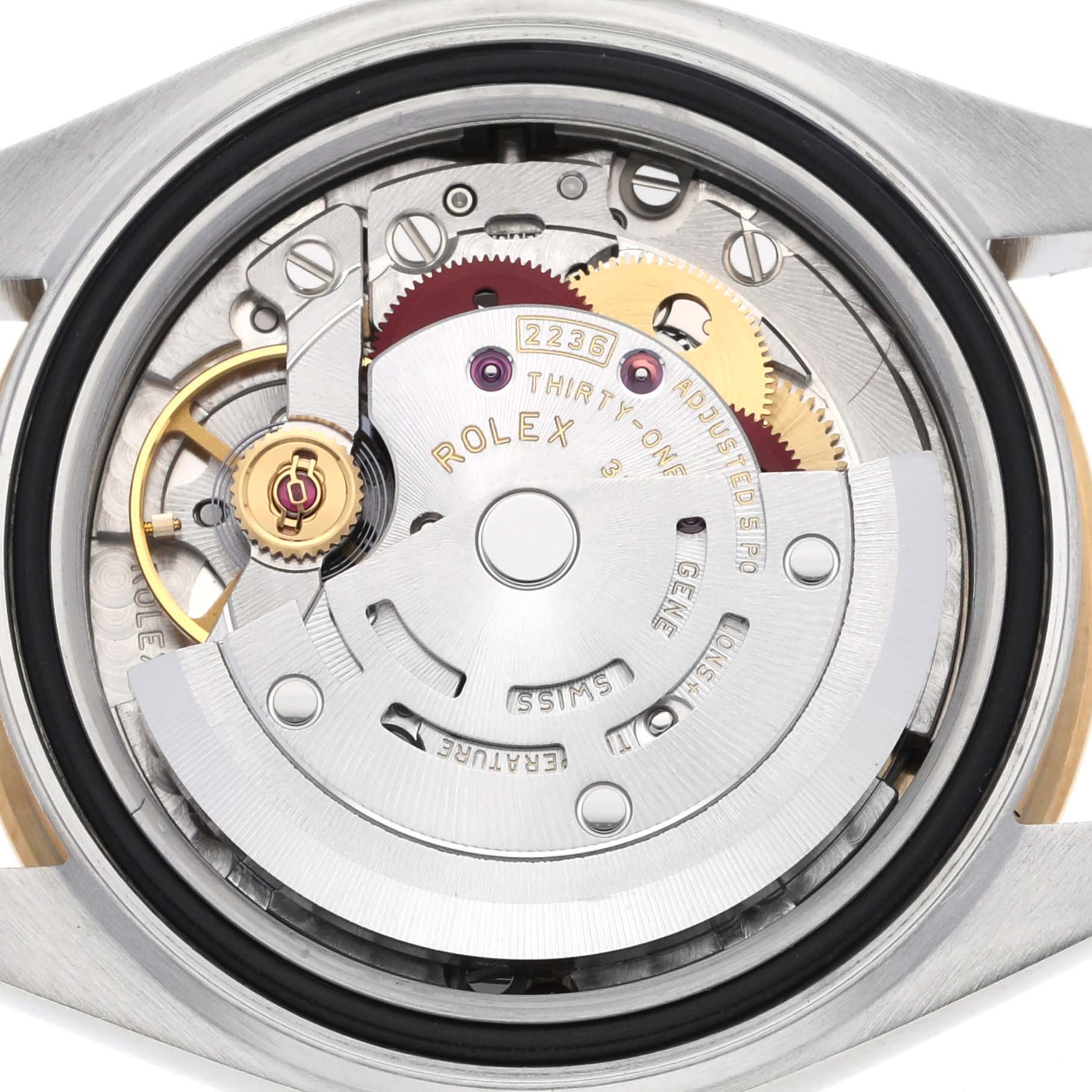 The image shows the intricate movement mechanism of a Rolex Datejust 279383RBR Women's Steel and Gold (two tone) Mother of Pearl Dial 279383RBR Women's Steel and Gold (two tone) Mother of Pearl Dial watch from the back.