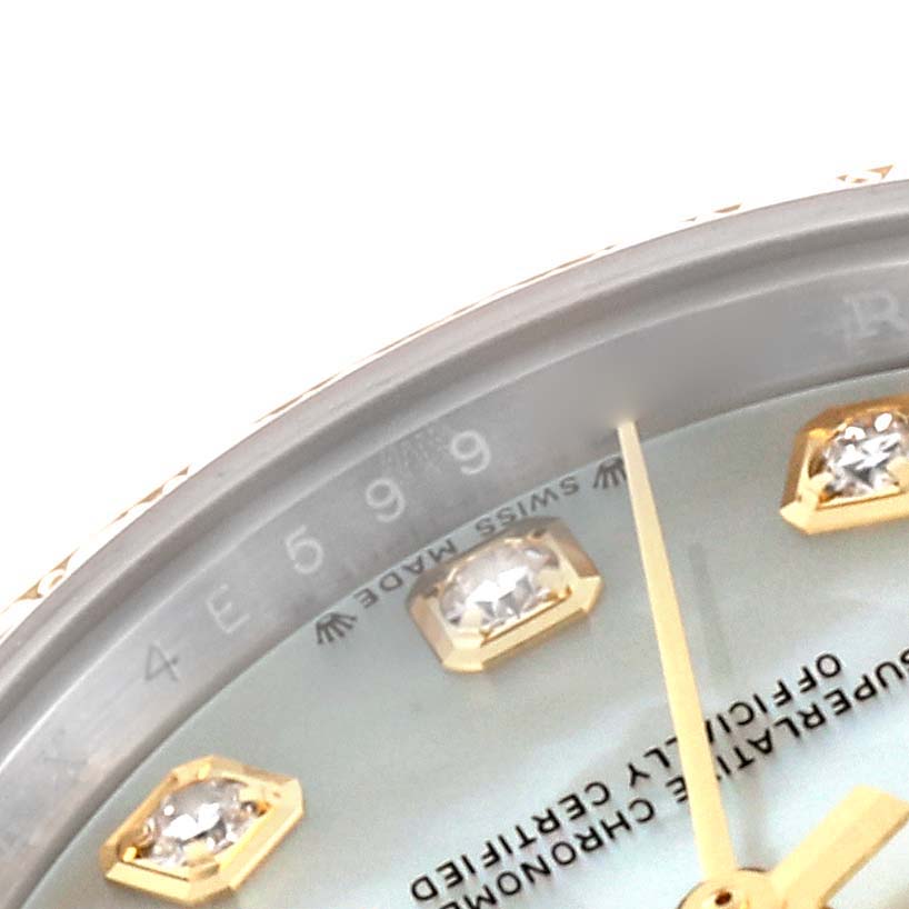The image shows a close-up of the Rolex Datejust 279383RBR Women's Steel and Gold (two tone) Mother of Pearl Dial 279383RBR Women's Steel and Gold (two tone) Mother of Pearl Dial dial with diamond hour markers and part of the text.