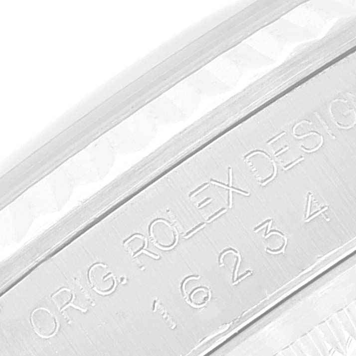 This close-up image shows the engraved model number "16234" on the side of a Rolex Datejust 16234 Men's Stainless Steel Black Dial 16234 Men's Stainless Steel Black Dial watch.