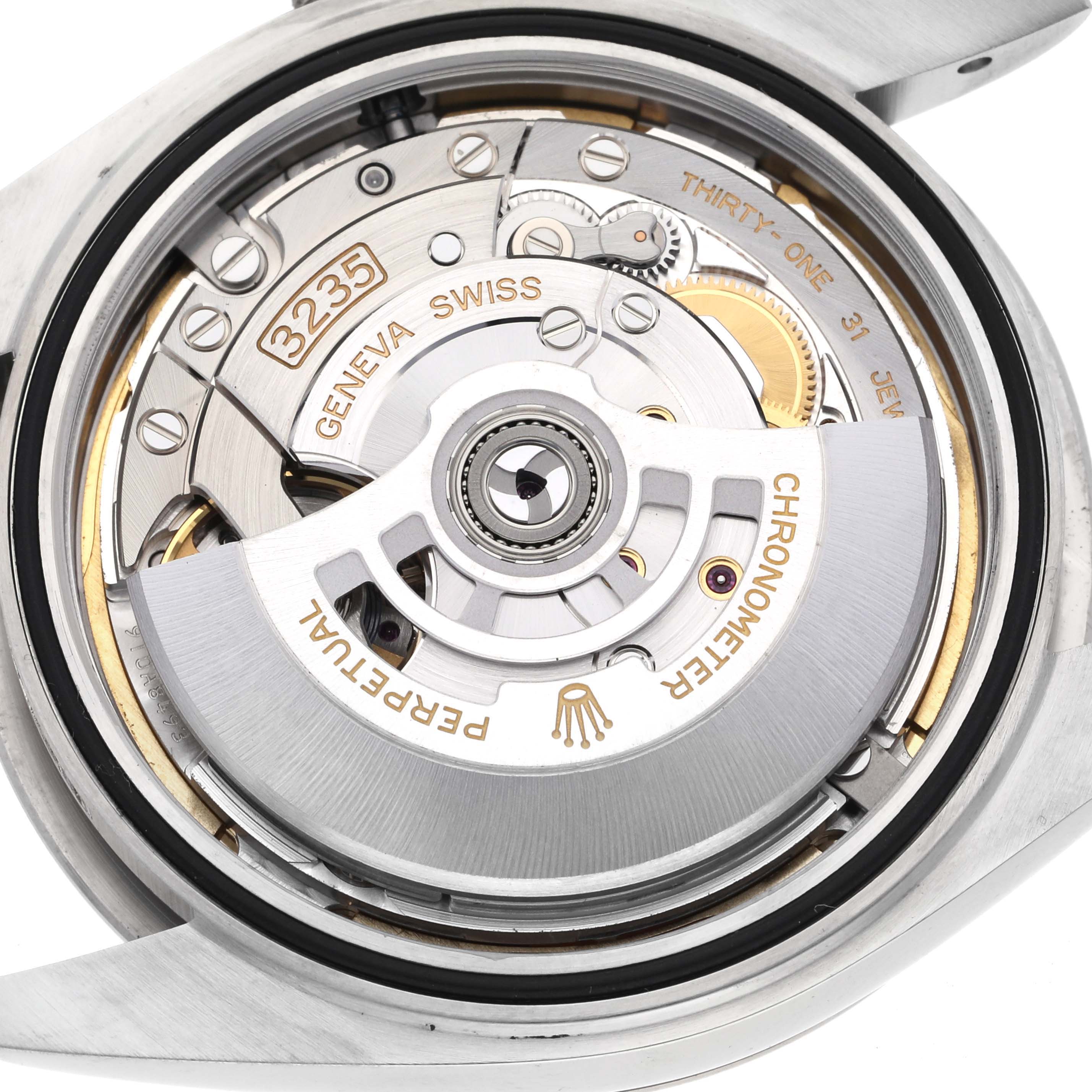 The image shows a close-up of the movement mechanism inside a Rolex Datejust 41 126334 Men's Stainless Steel Blue Dial 126334 Men's Stainless Steel Blue Dial.