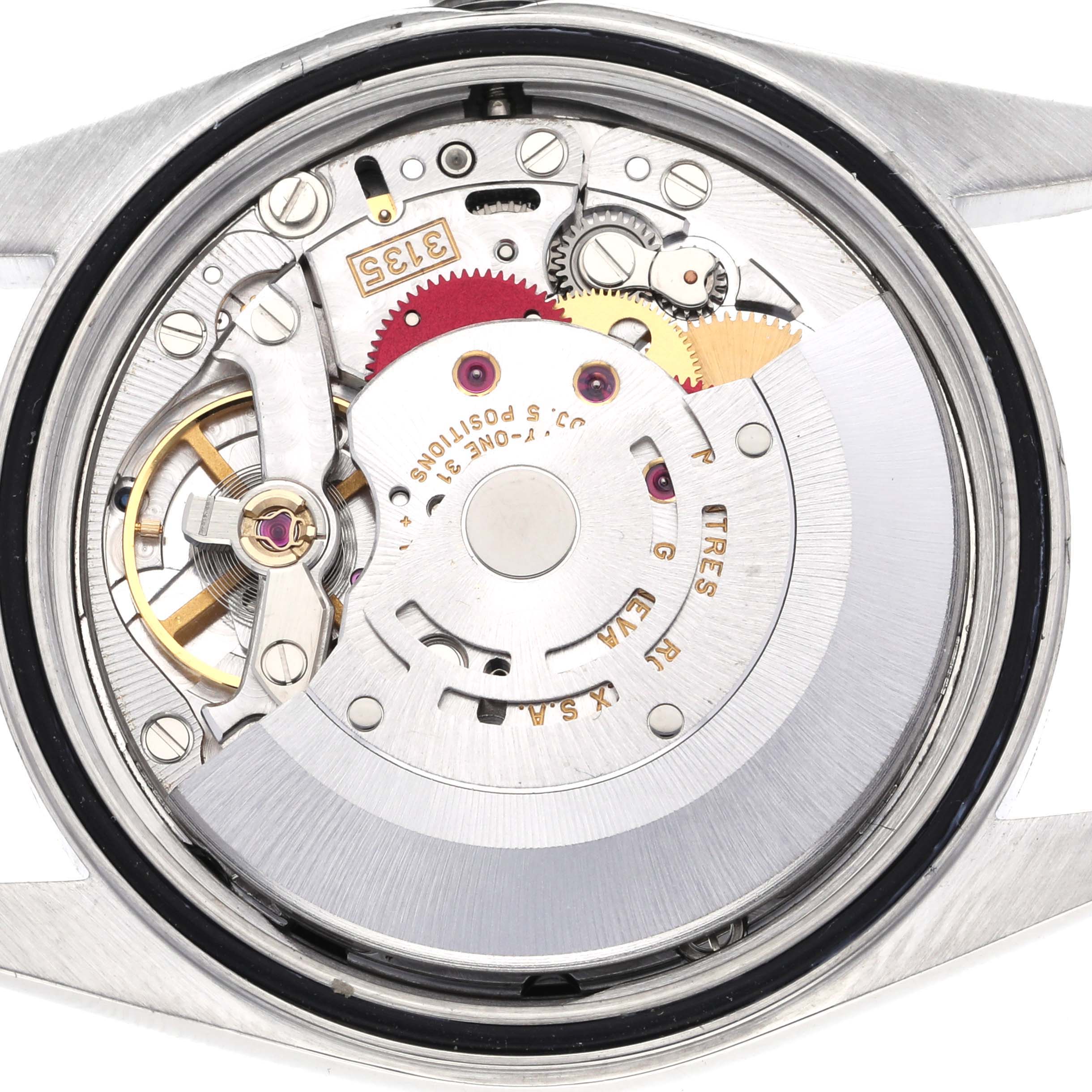 The image shows the inner mechanism of a Rolex Datejust 16234 Men
s Stainless Steel Black Dial 16234 Men
s Stainless Steel Black Dial watch from the back view, displaying its intricate components.
