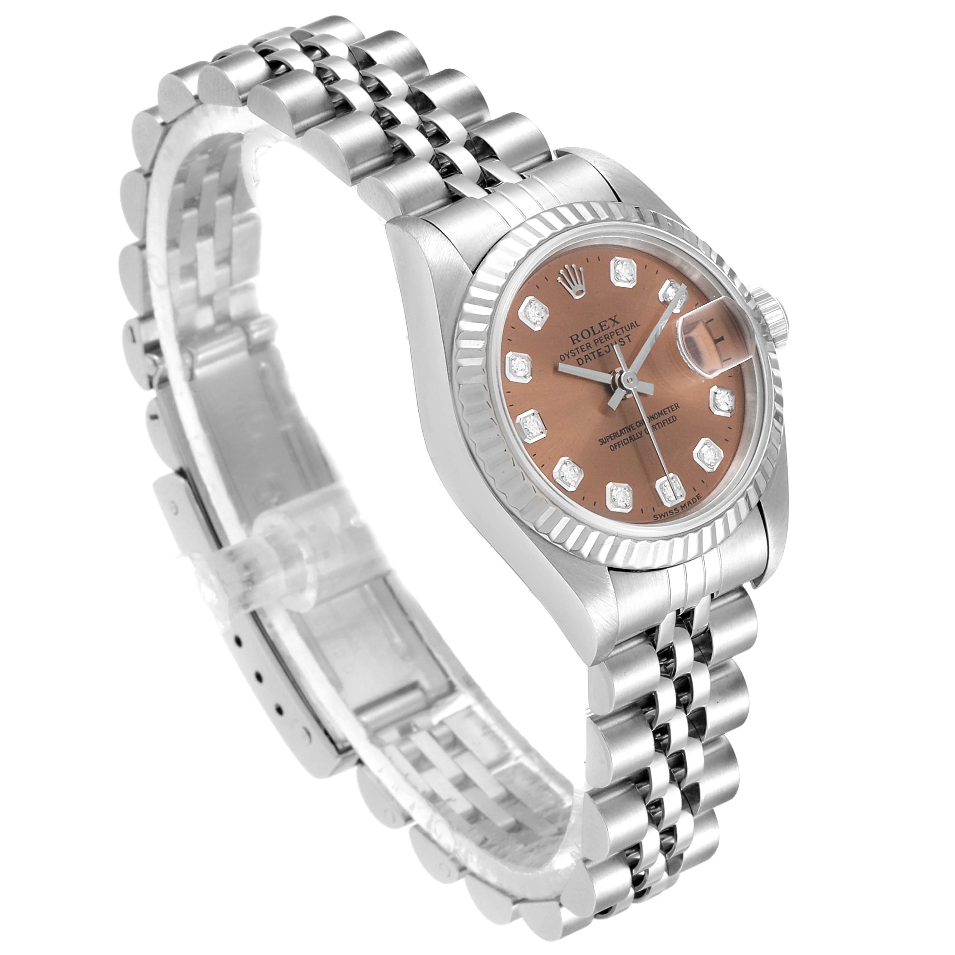 The Rolex Datejust 69174 Women's Stainless Steel Pink Dial 69174 Women's Stainless Steel Pink Dial watch is shown at a three-quarter angle, highlighting its face, bezel, and Jubilee bracelet.