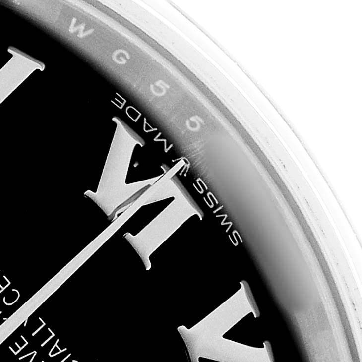 The image shows a close-up of the Rolex Mid-Size 278240 Women's Stainless Steel Black Dial watch face displaying part of the dial, Roman numerals, and the "Swiss Made" text.