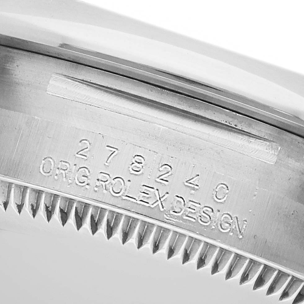 The image shows a close-up of the edge, bezel, and model number on the Rolex Mid-Size 278240 Women's Stainless Steel Black Dial watch.