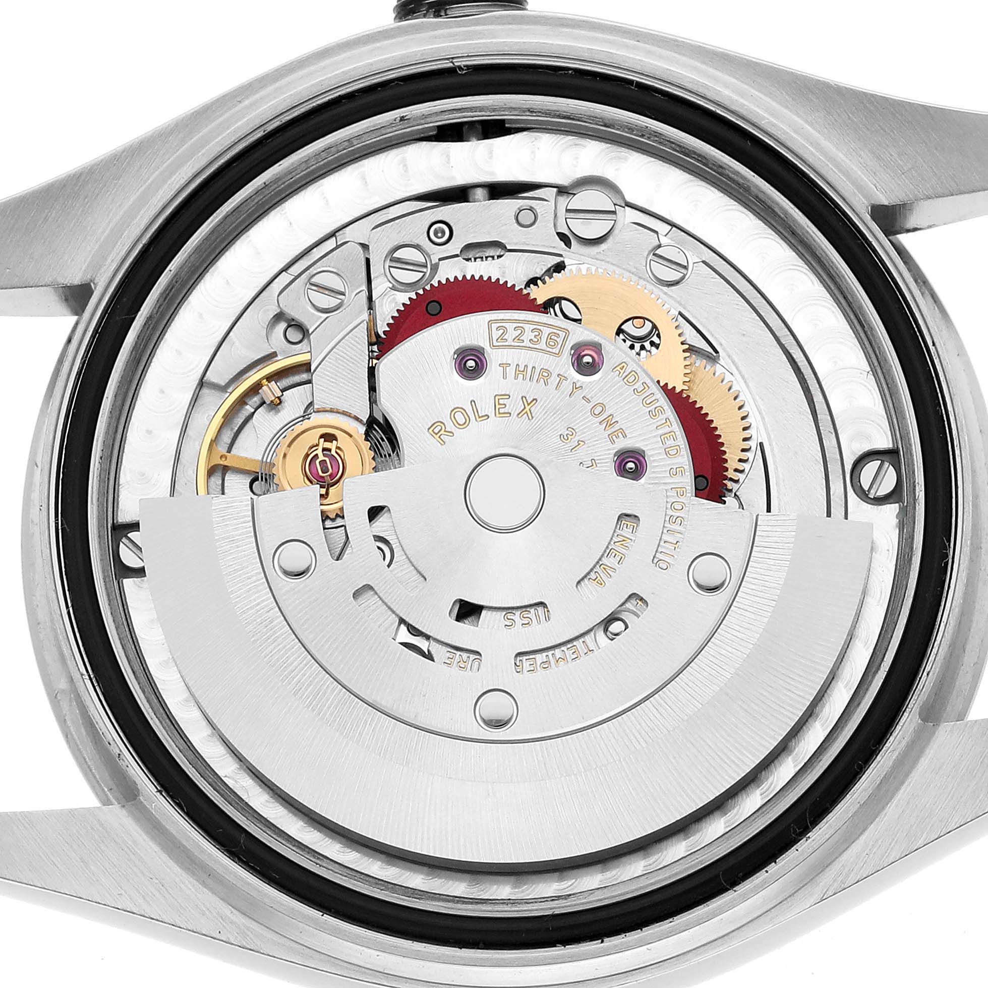 This image shows the movement and internal mechanism of a Rolex Mid-Size 278240 Women's Stainless Steel Black Dial model from the back.