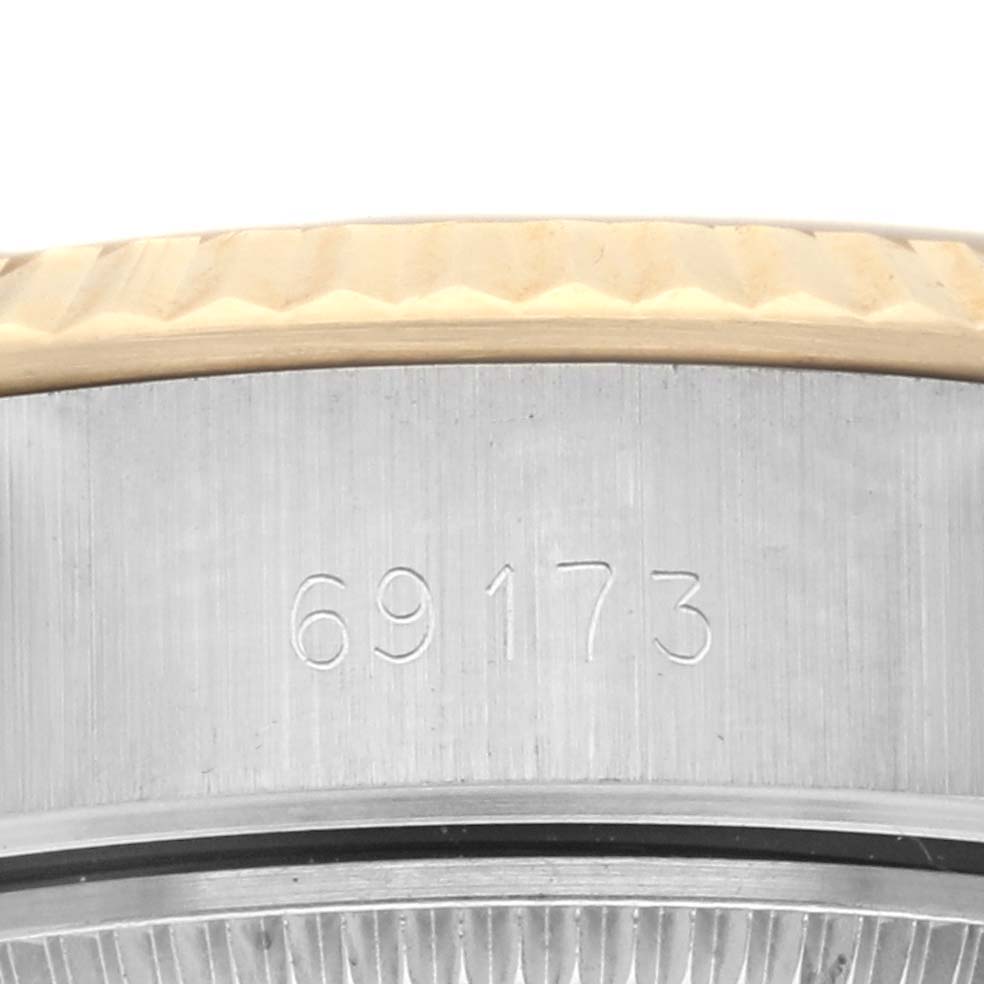The image shows the side view of a Rolex Datejust 69173 Women's Steel and Gold (two tone) Silver Dial 69173 Women's Steel and Gold (two tone) Silver Dial watch case, displaying the reference number.
