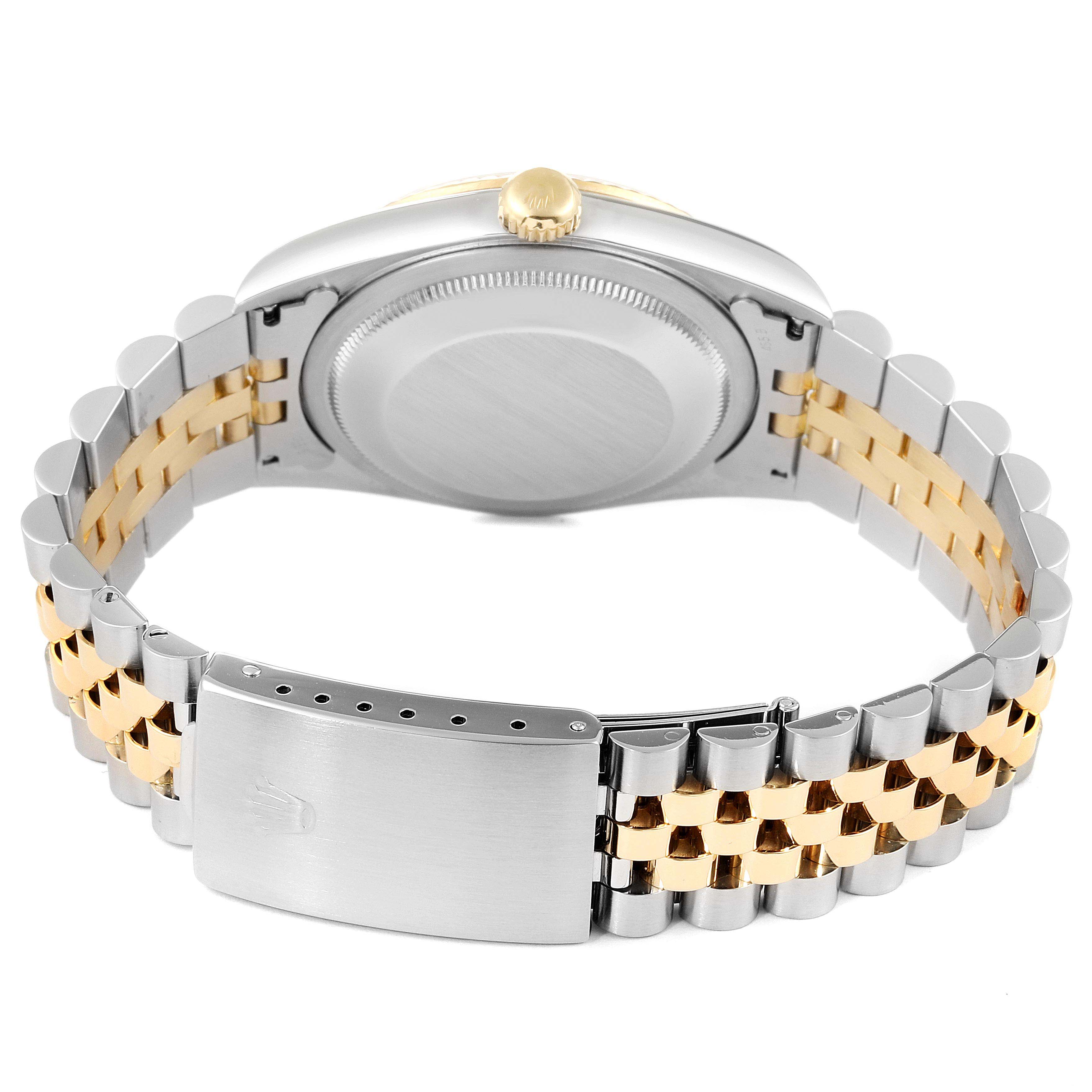 The image shows the back case and bicolor Jubilee bracelet with clasp of a Rolex Datejust 16233 Men's Steel and Gold (two tone) Silver Dial 16233 Men's Steel and Gold (two tone) Silver Dial watch.