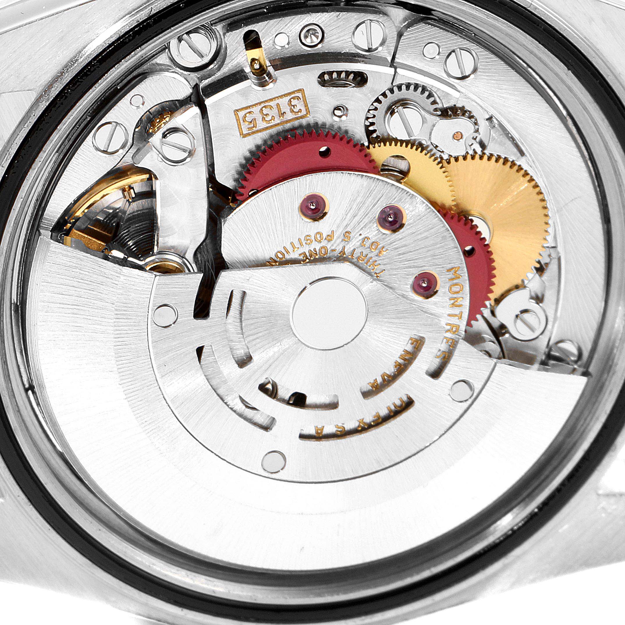The image shows the inner mechanical movement of the Rolex Datejust 16233 Men's Steel and Gold (two tone) Silver Dial 16233 Men's Steel and Gold (two tone) Silver Dial watch from a close-up angle.