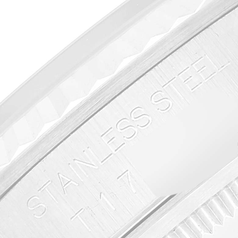 The image shows a close-up of a stainless steel bezel with inscriptions on a Rolex Datejust 16234 Men's Stainless Steel Mother of Pearl Dial 16234 Men's Stainless Steel Mother of Pearl Dial watch.