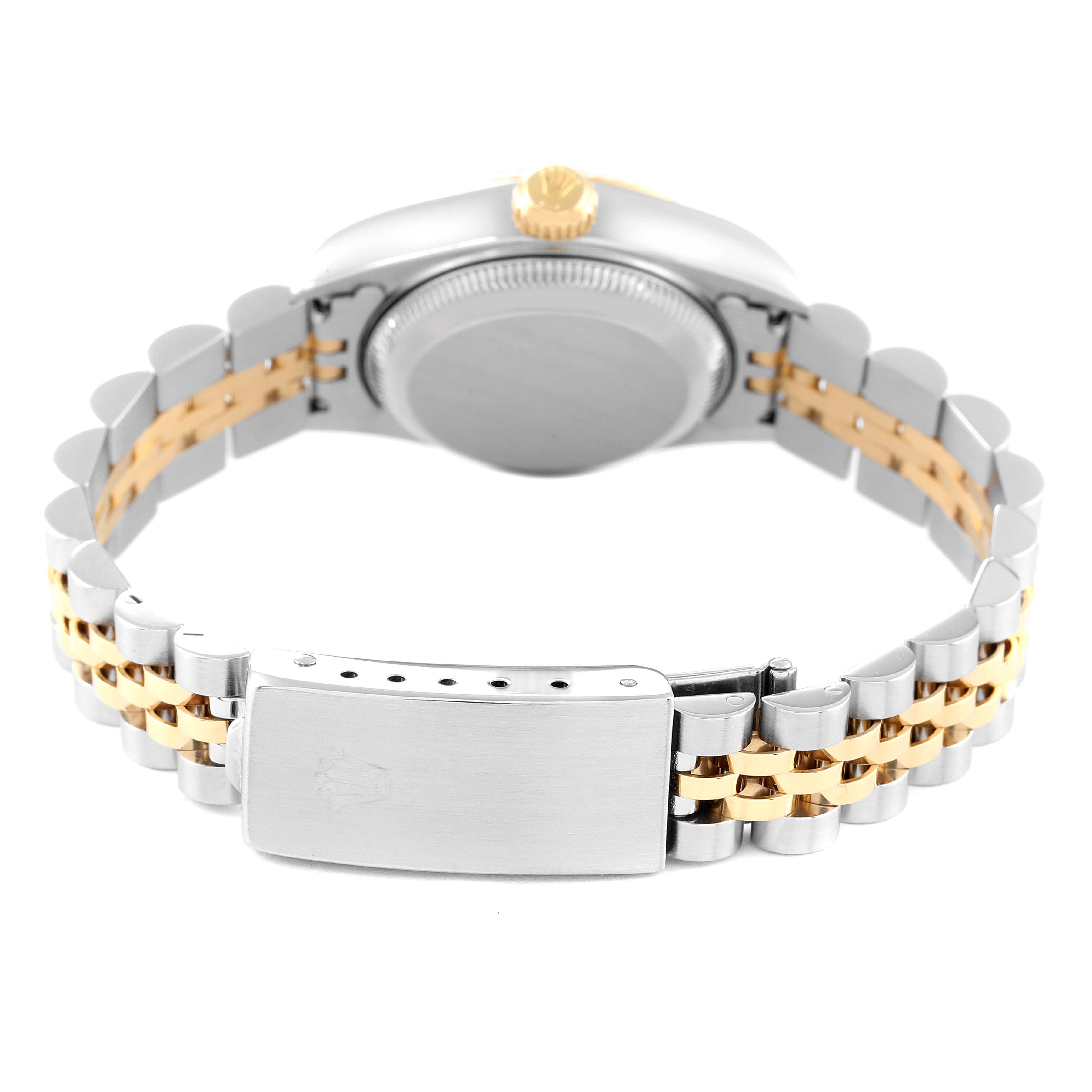 The image shows the back and clasp of a Rolex Datejust 79173 Women's Steel and Gold (two tone) Black Dial 79173 Women's Steel and Gold (two tone) Black Dial watch, focusing on the case, crown, and two-tone bracelet.