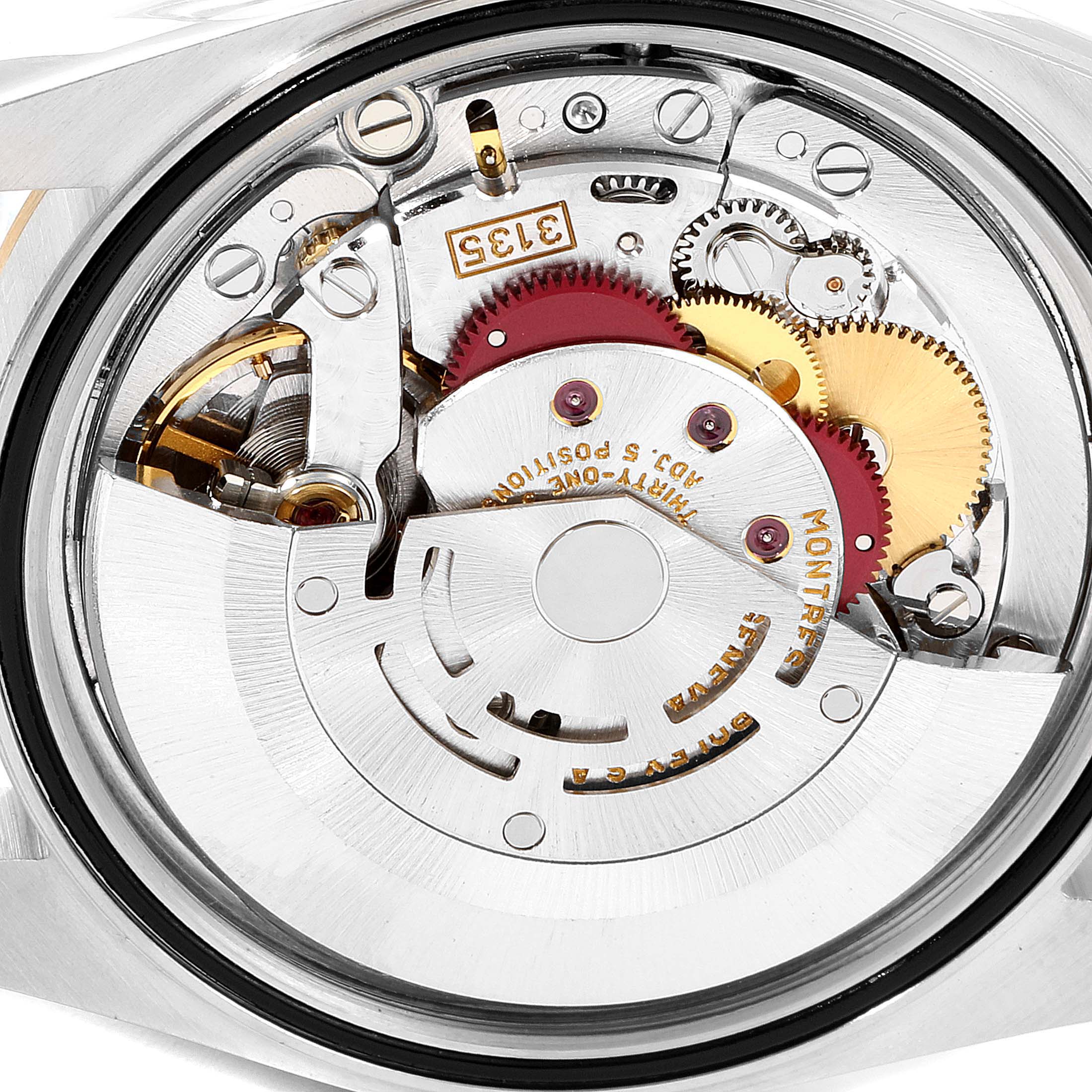 The image shows the intricate internal mechanism of the movement of a Rolex Datejust 16233 Men's Steel and Gold (two tone) Champagne Dial 16233 Men's Steel and Gold (two tone) Champagne Dial watch, viewed from the back.