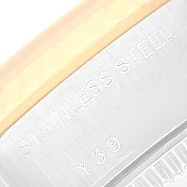 A close-up of the side of a Rolex Datejust 79173 Women's Steel and Gold (two tone) Grey Dial 79173 Women's Steel and Gold (two tone) Grey Dial watch, showing the stainless steel material and part of the casing.