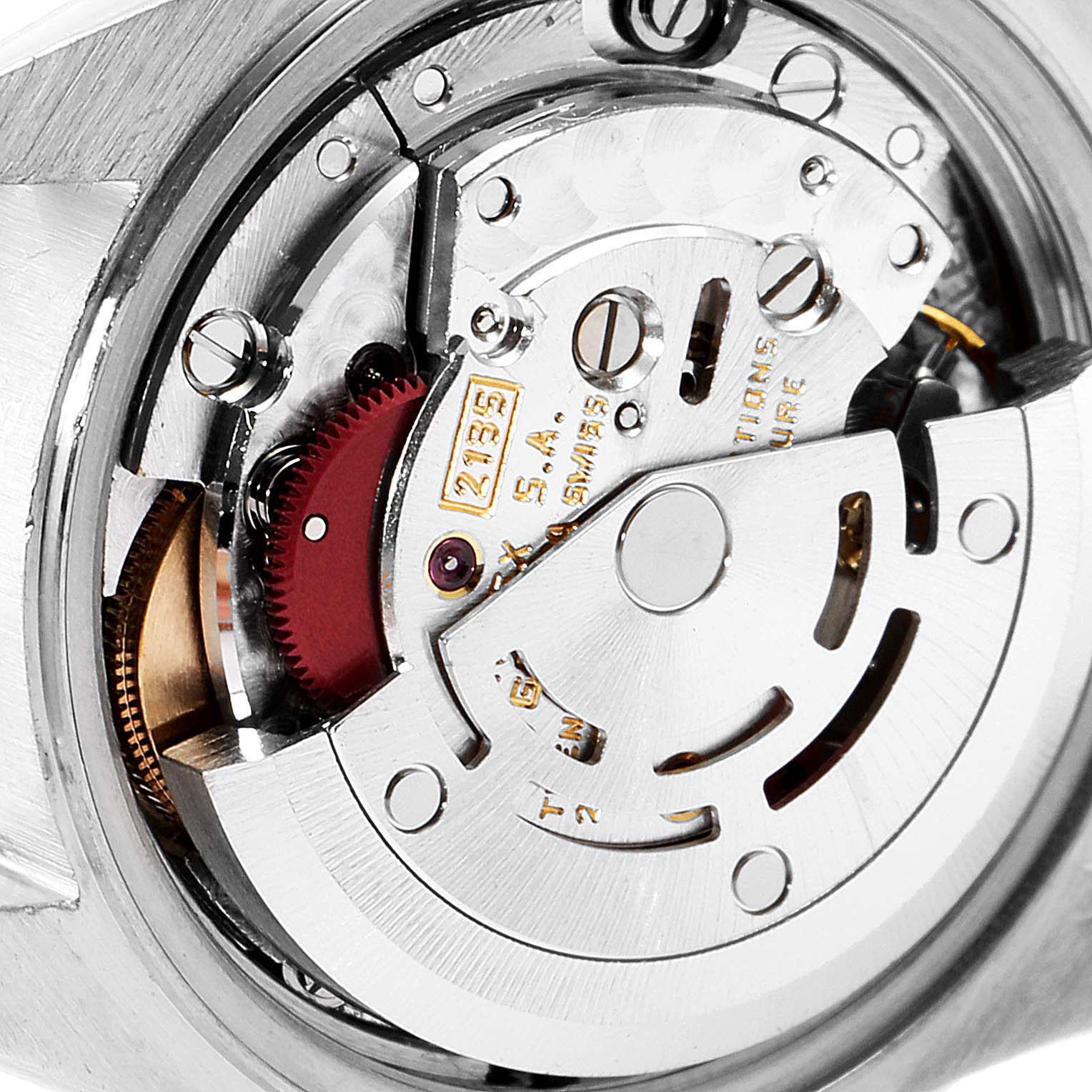 This image shows a close-up of the movement mechanism of a Rolex Datejust 69173 Women's Steel and Gold (two tone) White Dial 69173 Women's Steel and Gold (two tone) White Dial watch.
