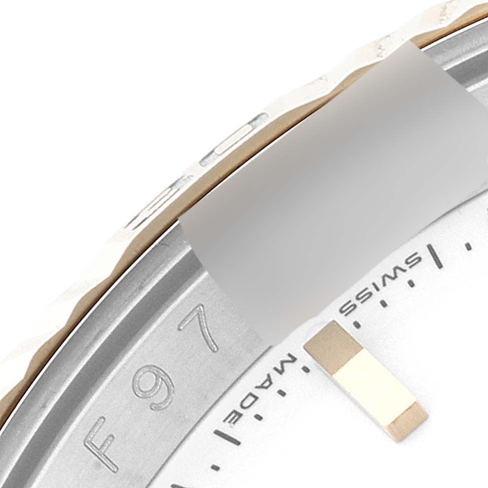 The image shows a close-up of the bezel, part of the dial, and casing of a Rolex Turn-o-Graph 116263 Men
s Steel and Gold (two tone) White Dial 116263 Men
s Steel and Gold (two tone) White Dial watch.