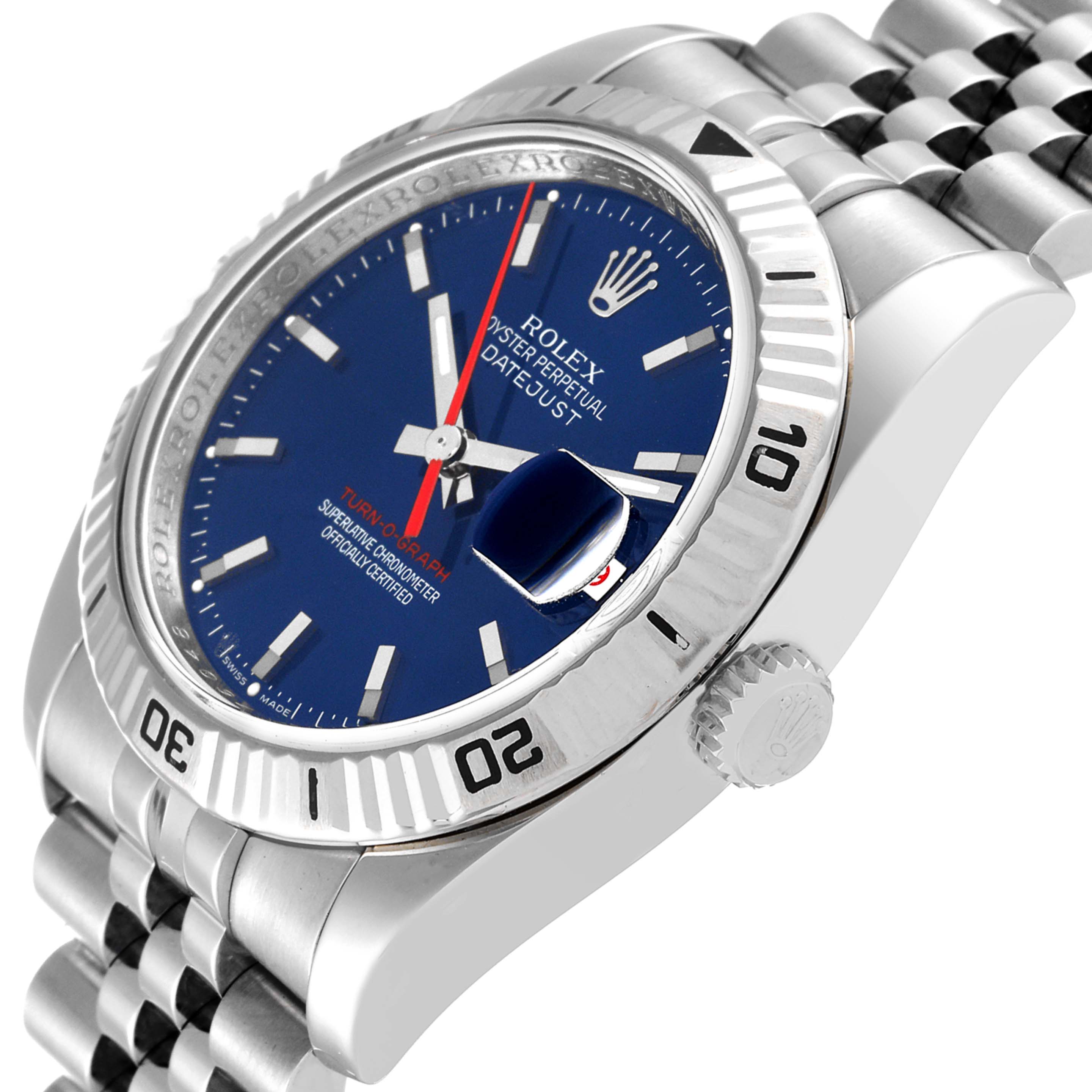 The image shows a side angle of a Rolex Turn-o-Graph 116264 Men
s Stainless Steel Blue Dial 116264 Men
s Stainless Steel Blue Dial watch, highlighting the blue dial, bezel, crown, and part of the bracelet.