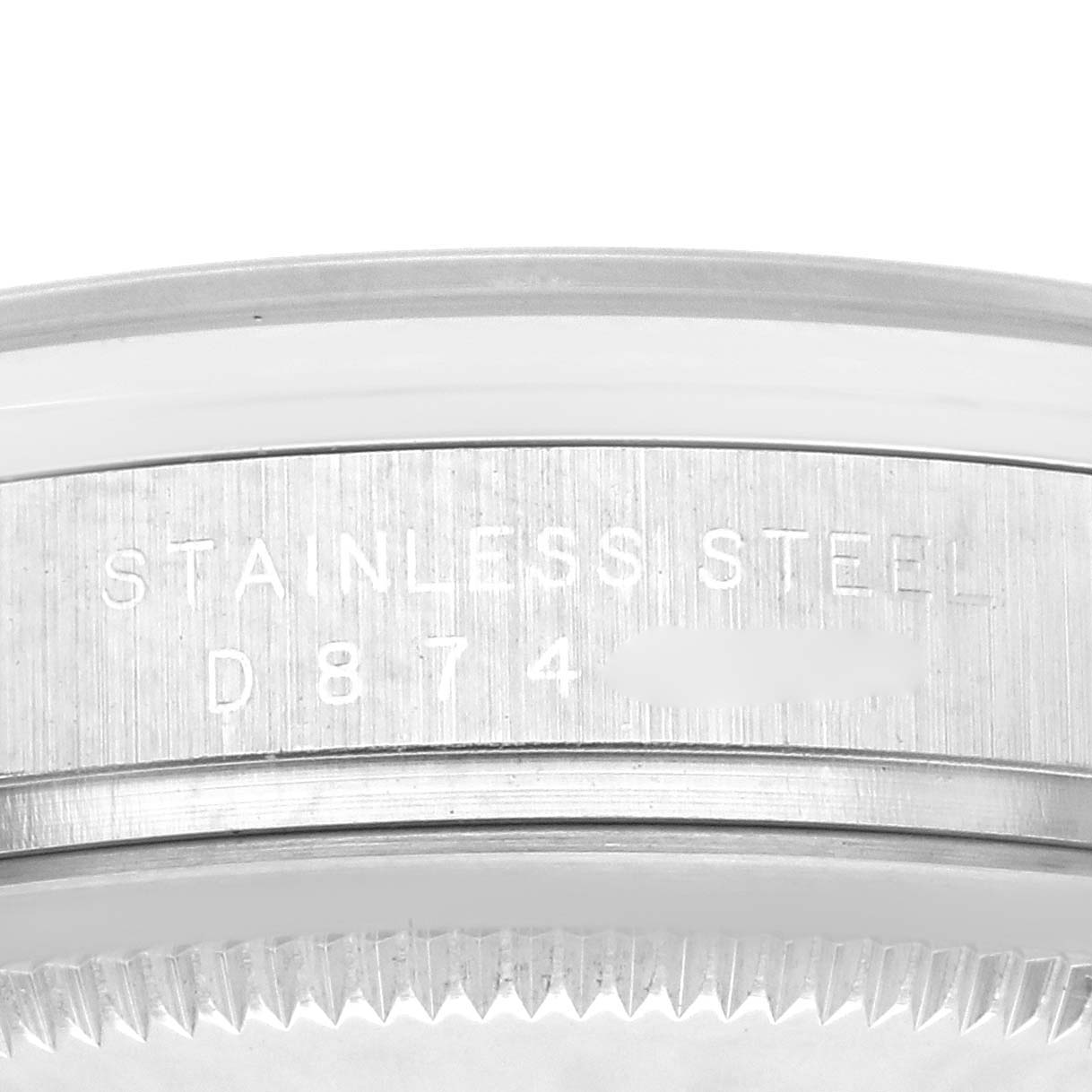 The image shows the side of a Rolex Explorer 114270 Men
s Stainless Steel Black Dial 114270 Men
s Stainless Steel Black Dial watch, highlighting the stainless steel casing with an engraved serial number.