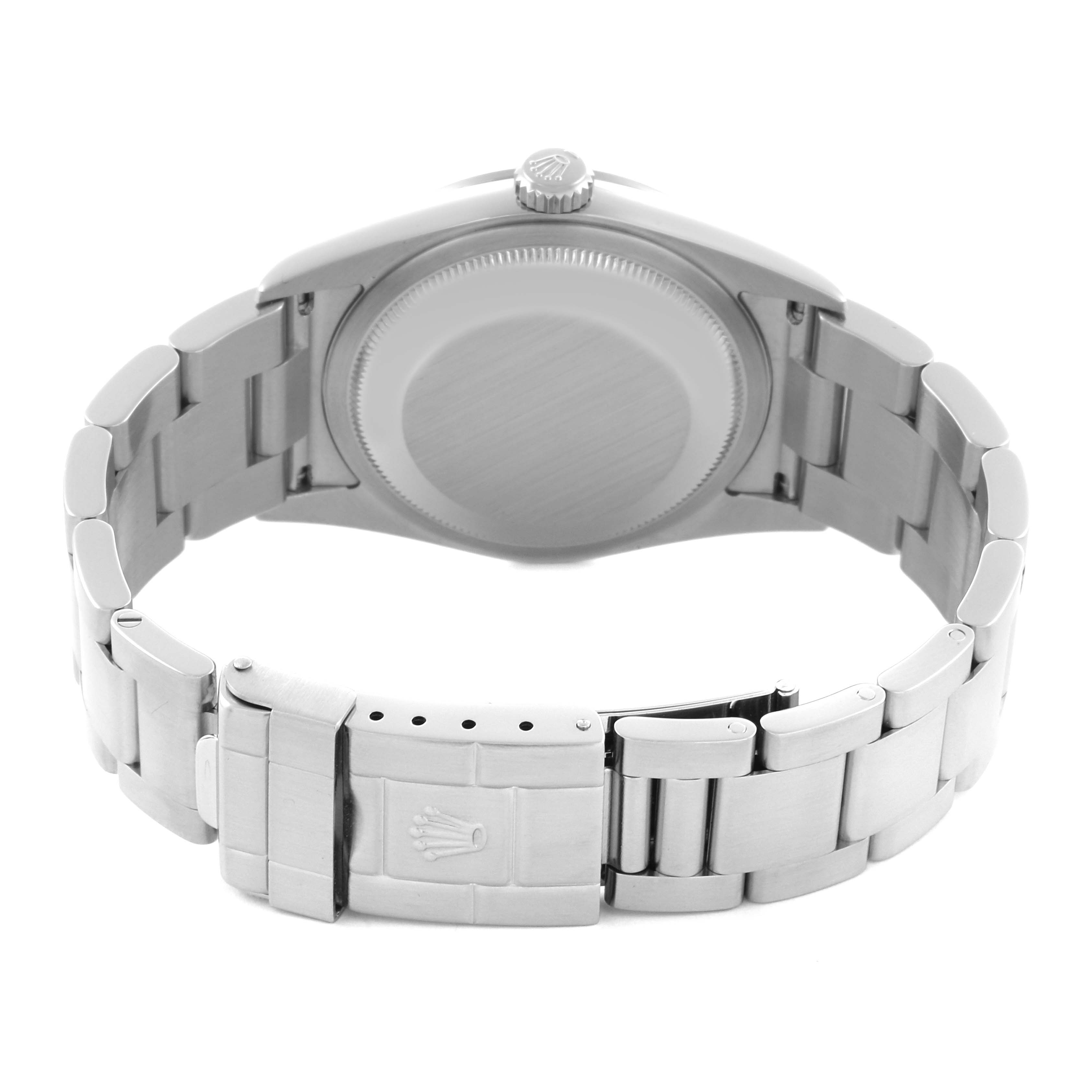 The Rolex Explorer 114270 Men
s Stainless Steel Black Dial 114270 Men
s Stainless Steel Black Dial watch is shown from the back, highlighting the case back and metal bracelet with clasp.