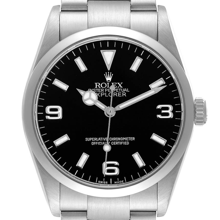 The Rolex Explorer watch is shown from a front angle, highlighting the face, bezel, hands, and part of the bracelet.