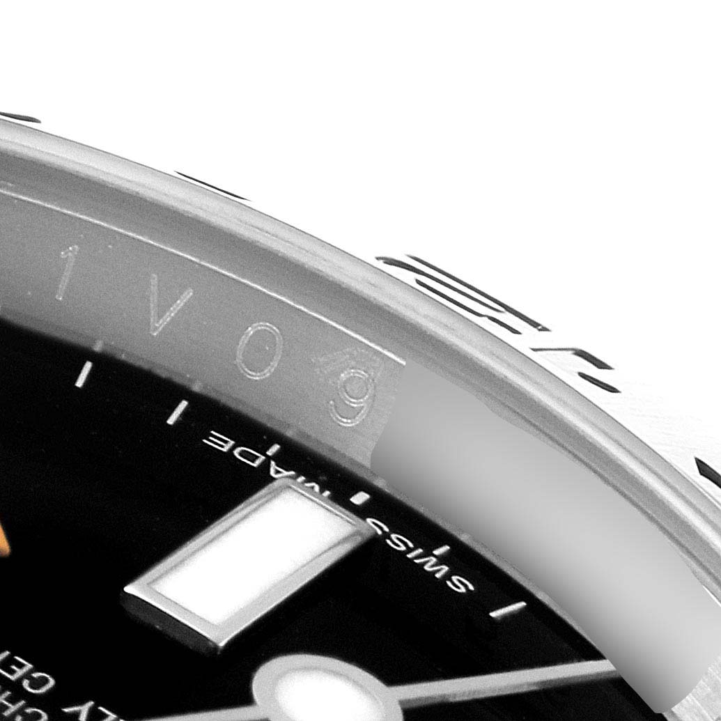 This image shows a close-up of the dial and bezel of a Rolex Explorer 216570 Men
s Stainless Steel Black Dial 216570 Men
s Stainless Steel Black Dial watch.