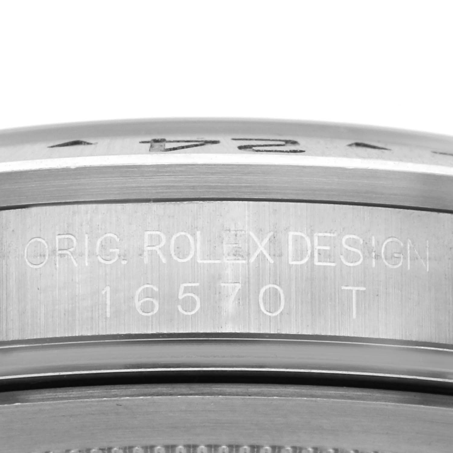 The image shows a close-up of the side of a Rolex Explorer 16570T Men
s Stainless Steel Black Dial 16570T Men
s Stainless Steel Black Dial
s case, highlighting the engraved model details.
