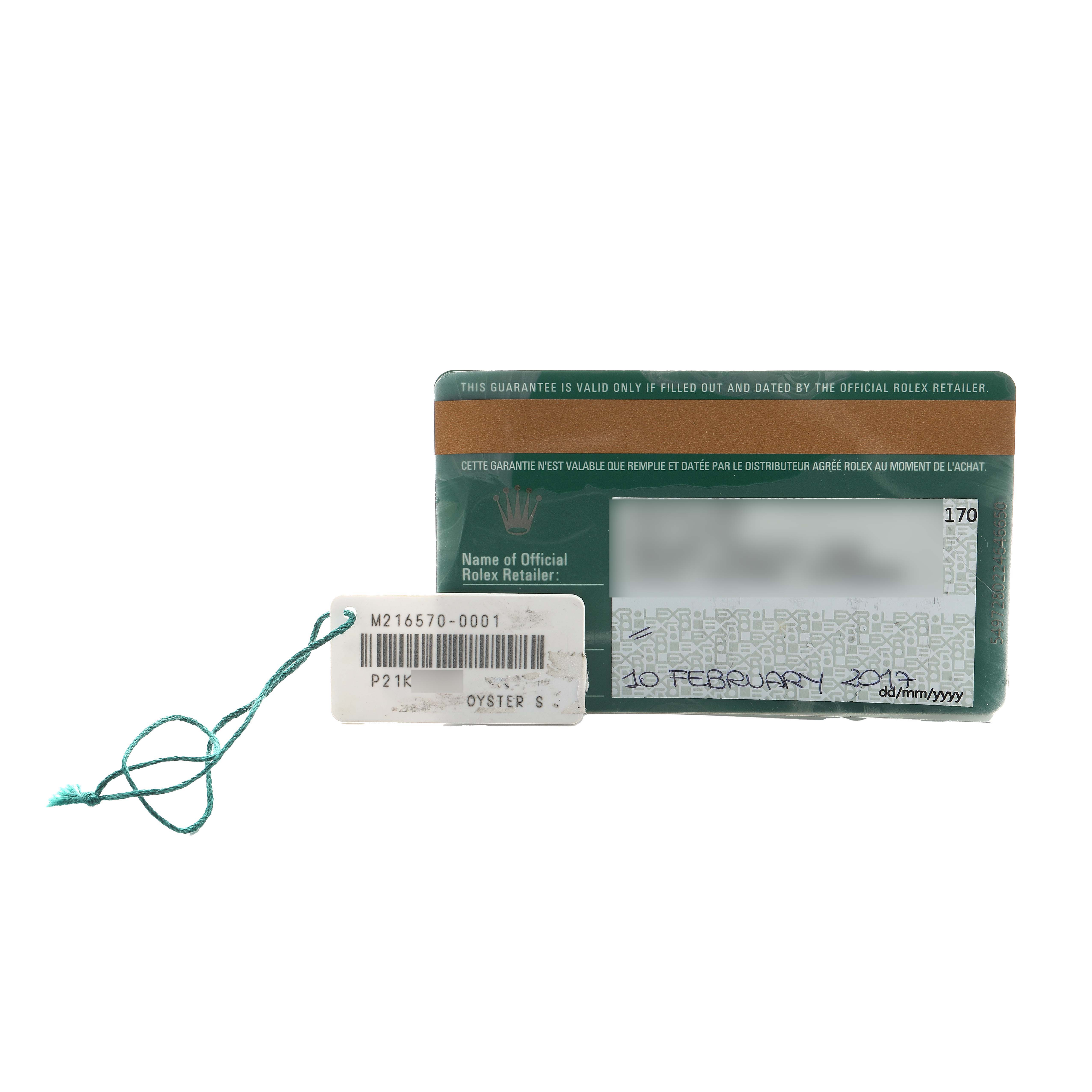 The image shows the warranty card and tag for a Rolex Explorer 216570 Men's Stainless Steel White Dial, with details like model number and purchase date.