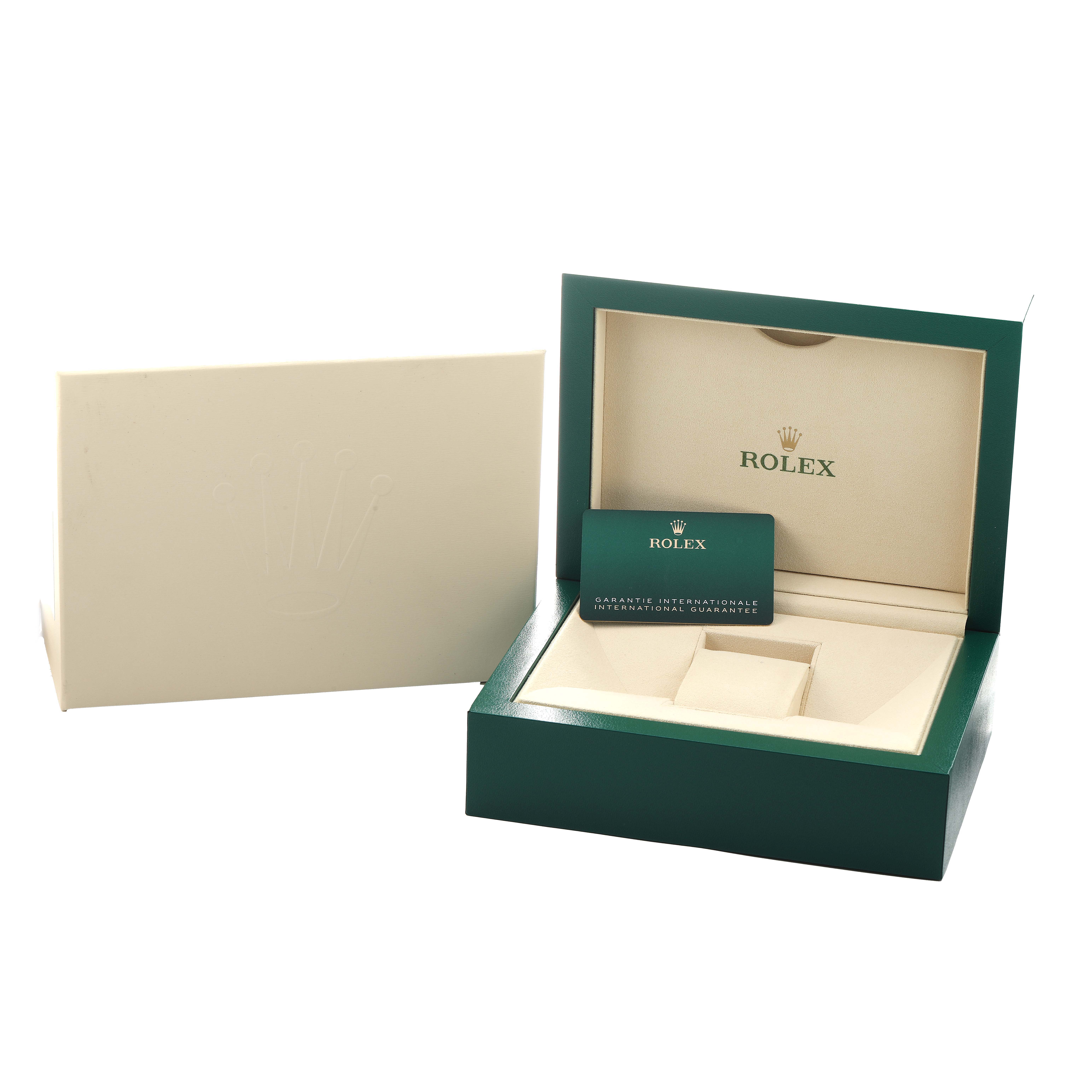 The image shows the box and guarantee card for a Rolex GMT-Master 126710 Men's Stainless Steel Black Dial watch, displayed at a three-quarter angle.