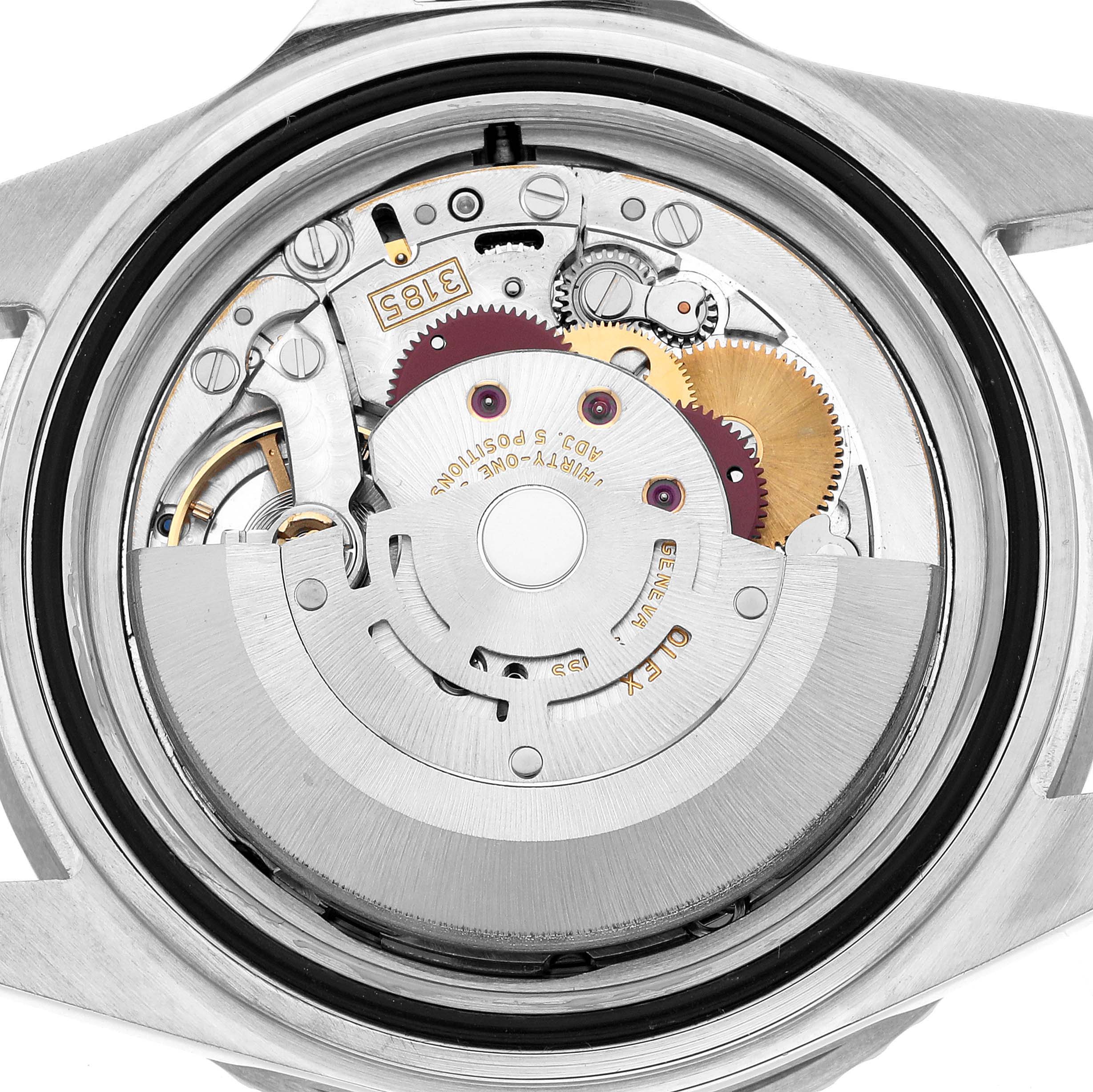 The image shows the movement mechanism of a Rolex GMT-Master 16710 Men's Stainless Steel Black Dial watch from the back view, highlighting gears and rotors.