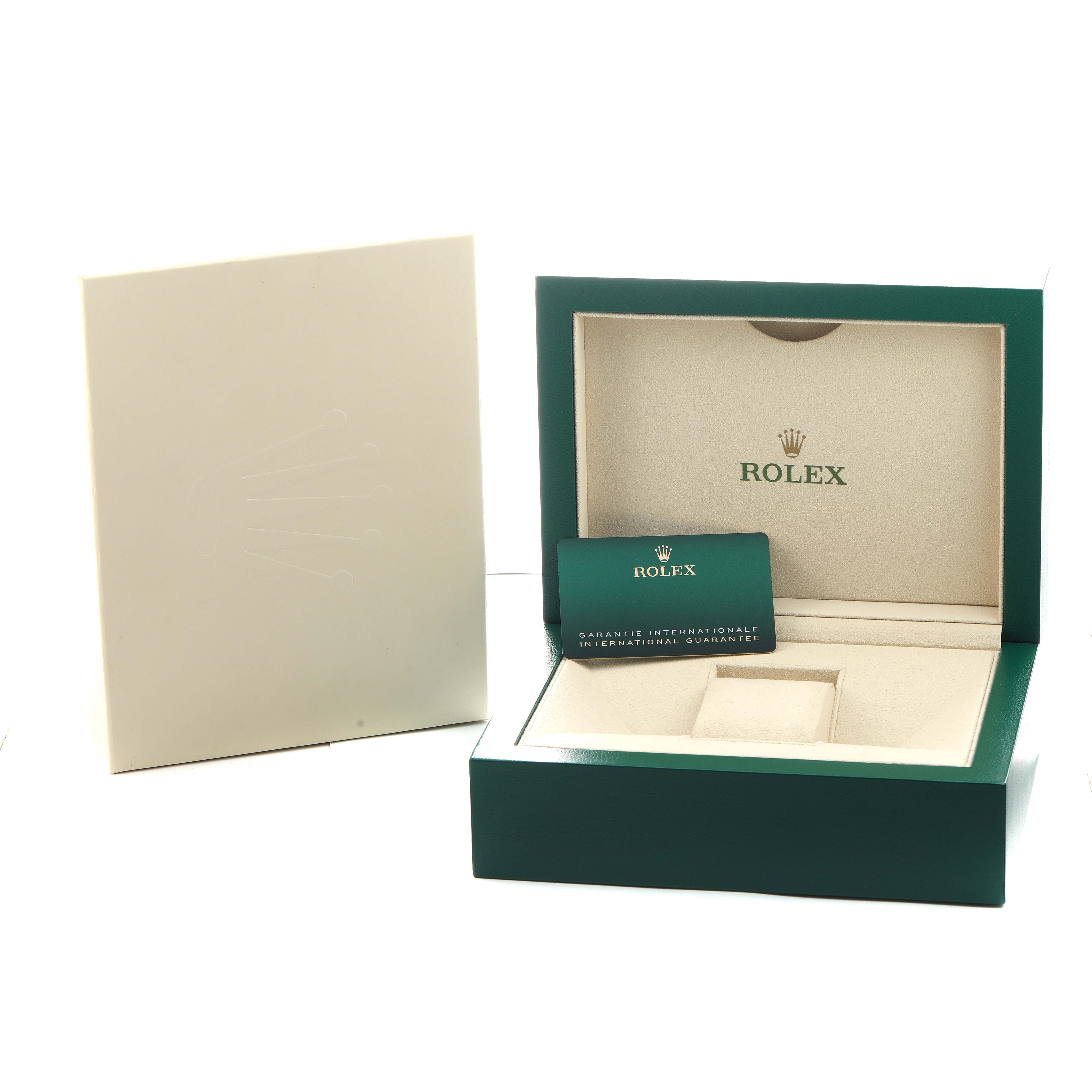 The image shows a Rolex GMT-Master 126713 Men's Steel and Gold (two tone) Black Dial watch box and international warranty card, viewed from the front.