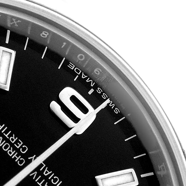 The image shows a close-up of the dial edge of a Rolex Mid-Size 177200 Women's Stainless Steel Black Dial model, highlighting the "6" numeral and "SWISS MADE" text.